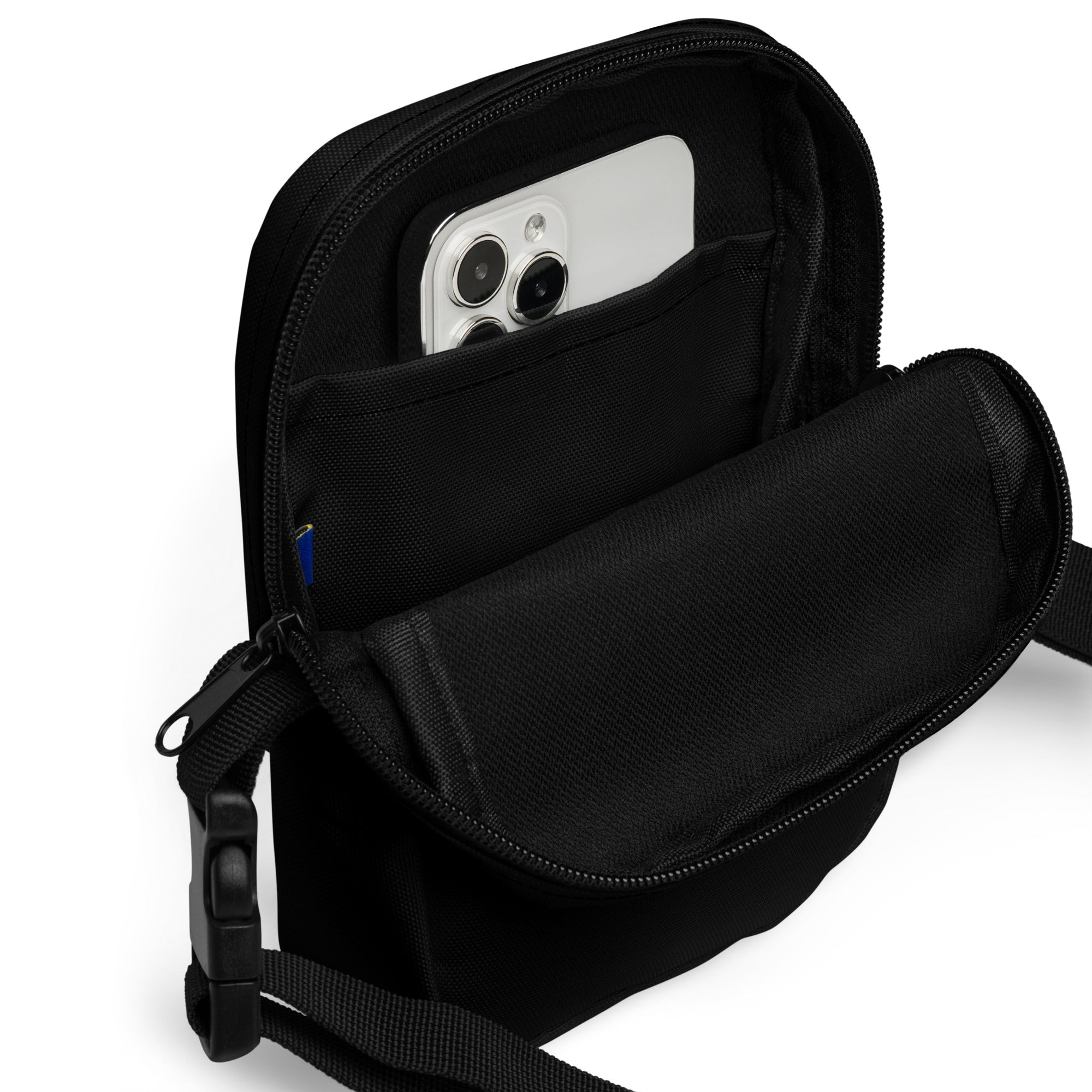 Girls black nylon crossbody purse with zippered main compartment and interior phone pocket for easy organization