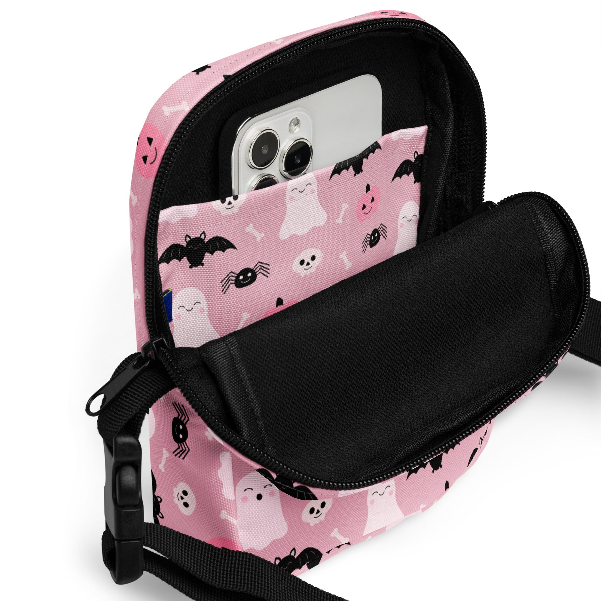 Girls cute ghost and bats pink halloween crossbody purse with black bat ghost and spider print on fabric surface