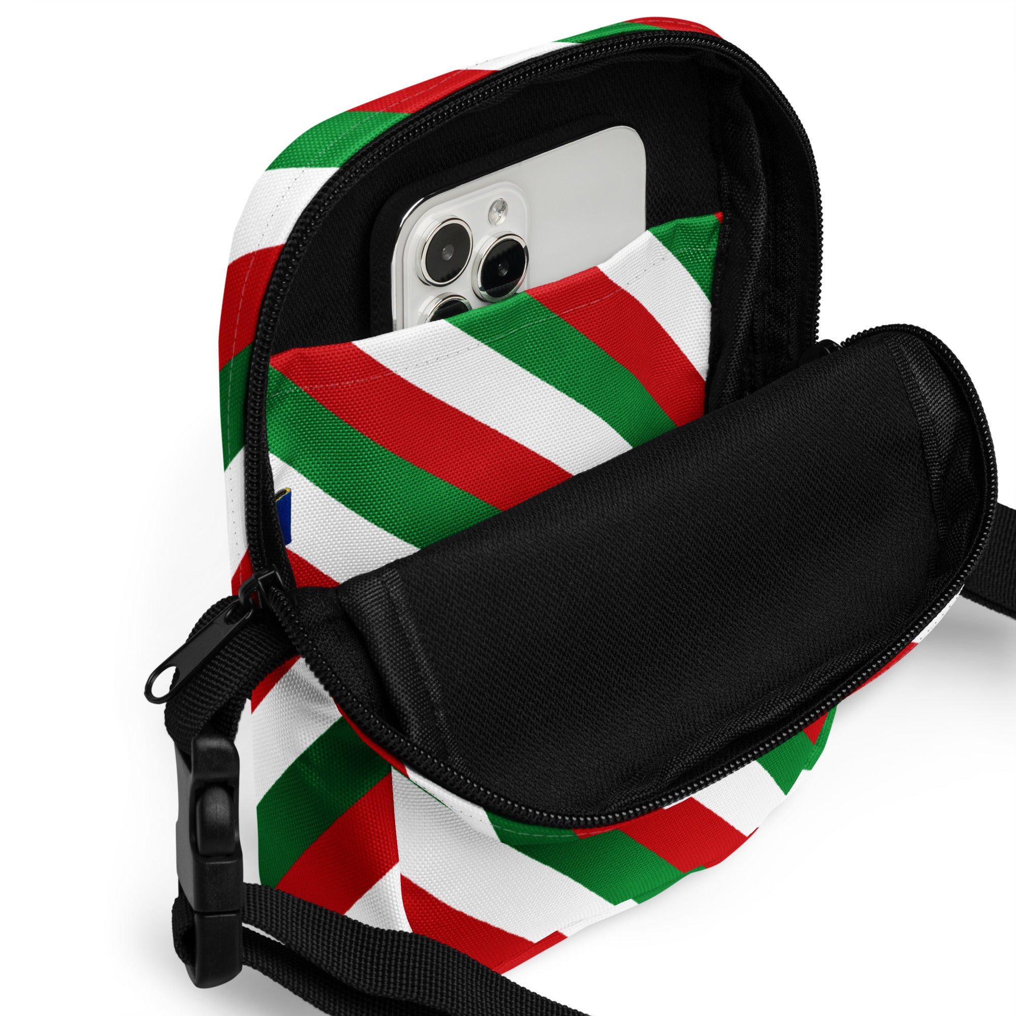 Red and green diagonal candy stripe christmas women’s crossbody phone pouch with black interior lining