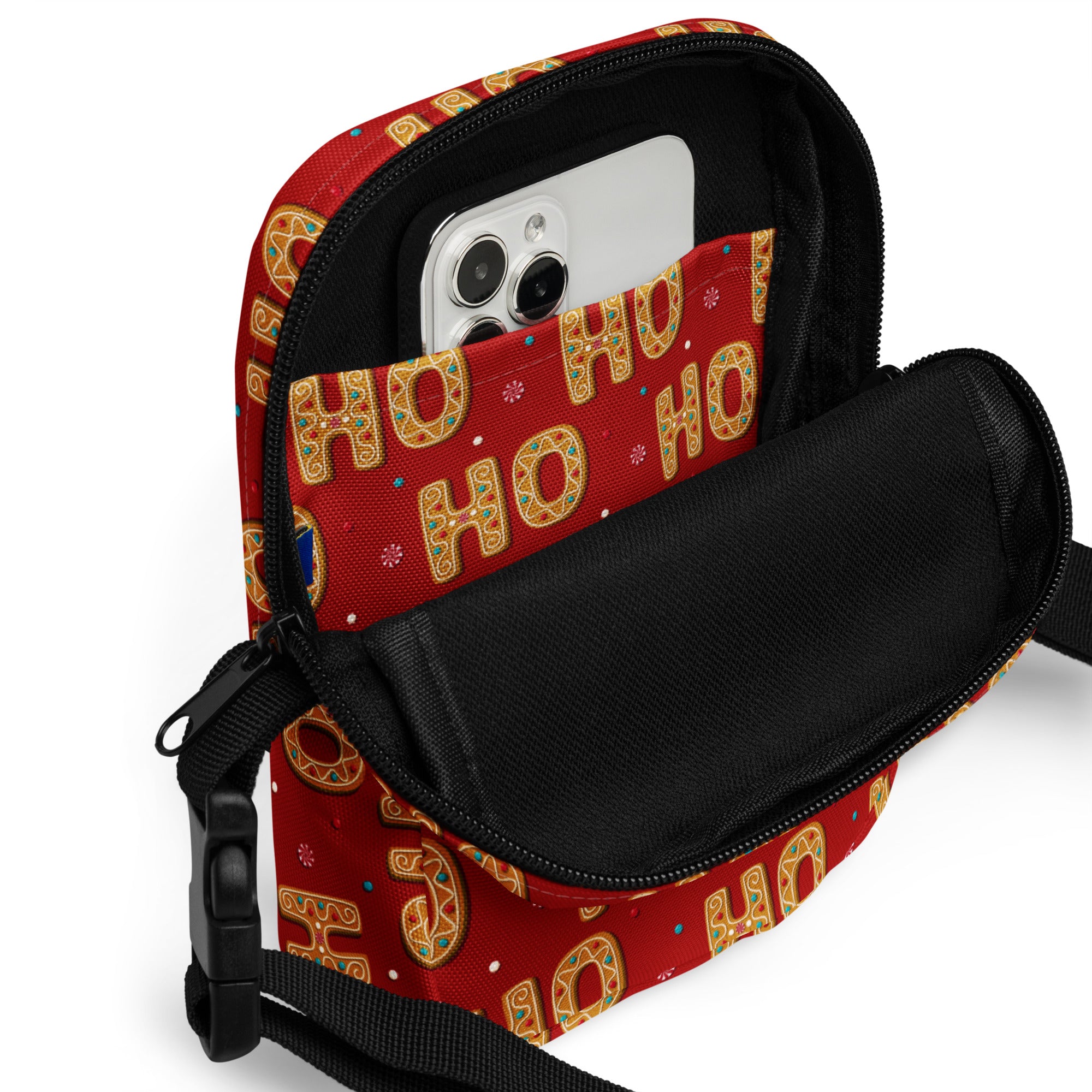 Girls gingerbread ho ho ho red christmas crossbody bag with gold green lettering black interior and adjustable strap