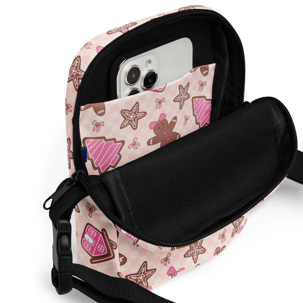 Girls pink gingerbread christmas crossbody purse with brown holiday-themed phone pouch black zipper and adjustable strap