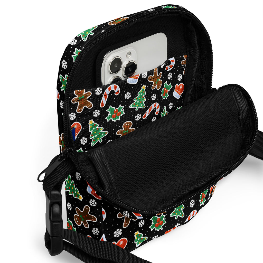 Black girls crossbody purse with gingerbread man candy cane and tree patterns on fabric for christmas use