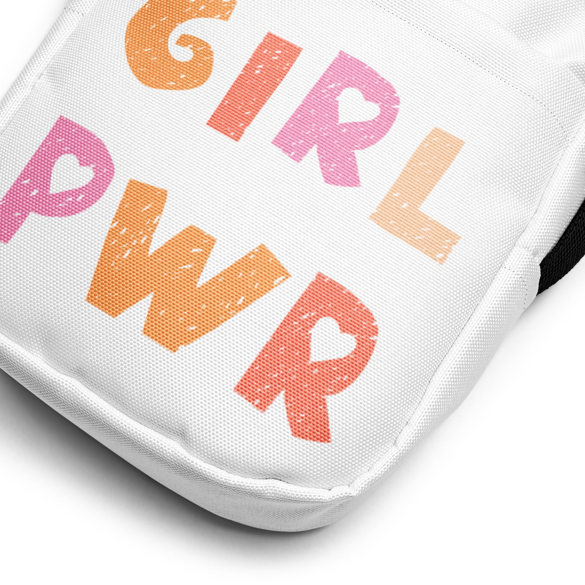 White canvas girl power kids crossbody purse with bold pink and orange lettering and heart shaped cutouts