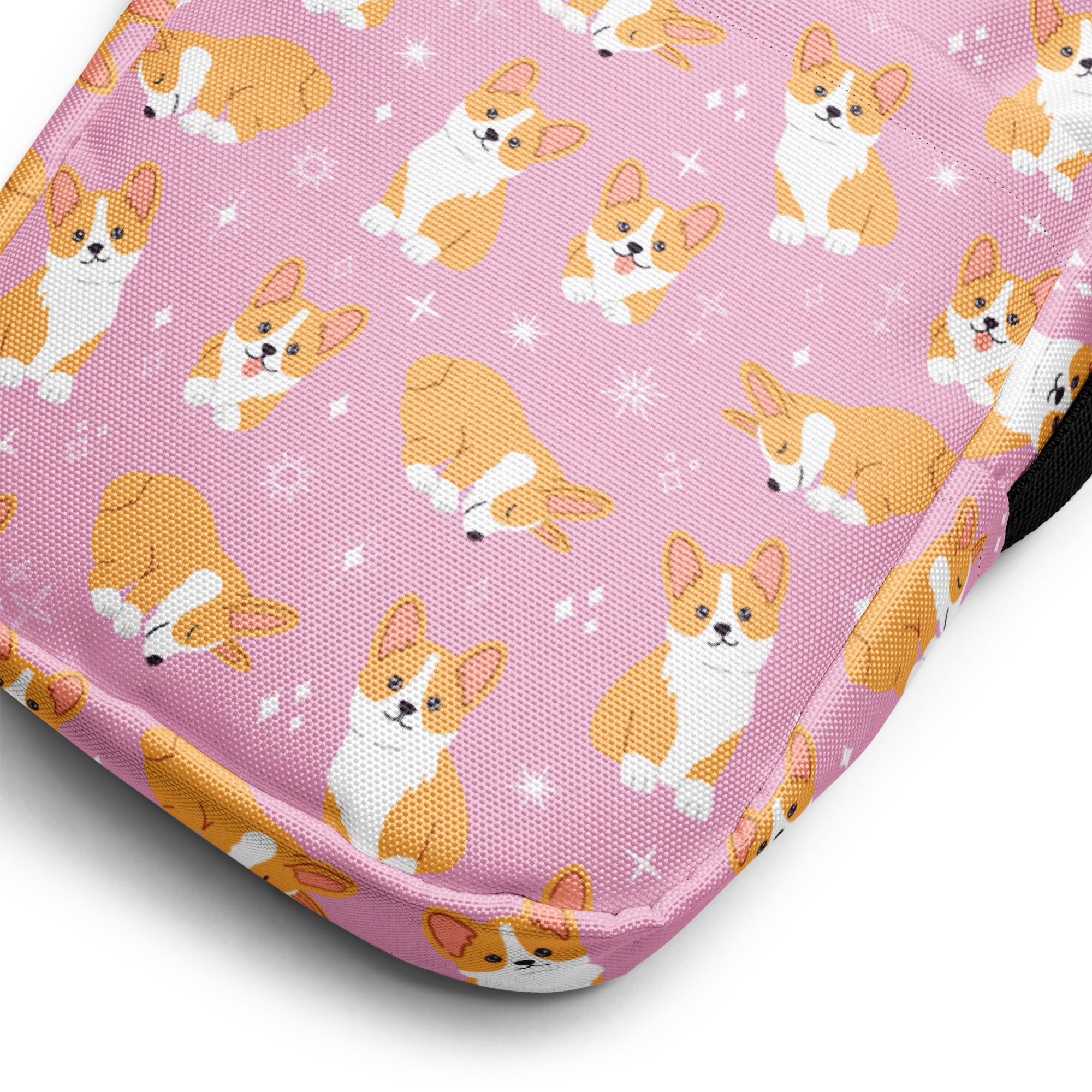 Girls pink corgi crossbody purse made of fabric pouch with repeating orange and white corgi dog pattern and star accents