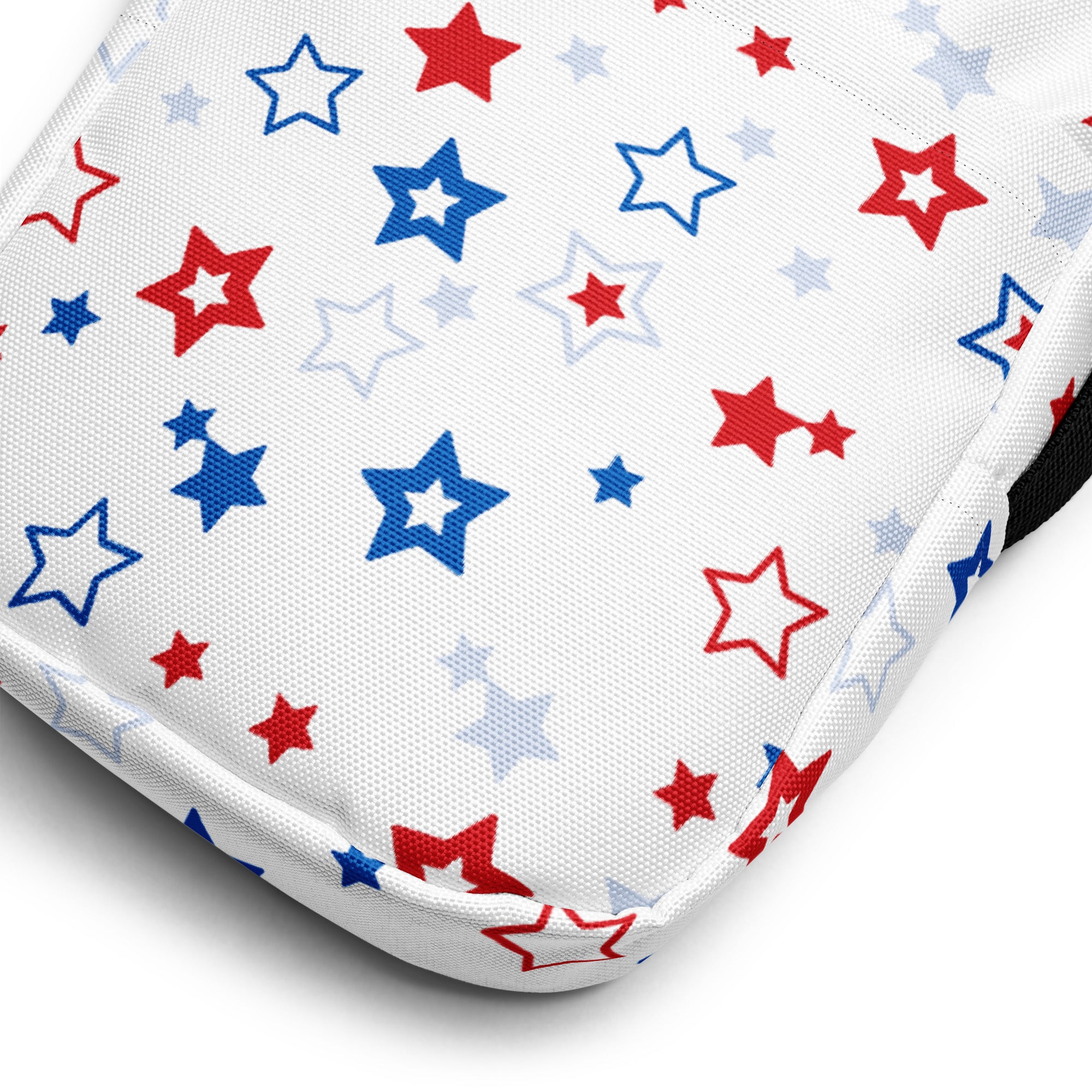 White fabric crossbody purse for girls with red white and blue star pattern and playful design
