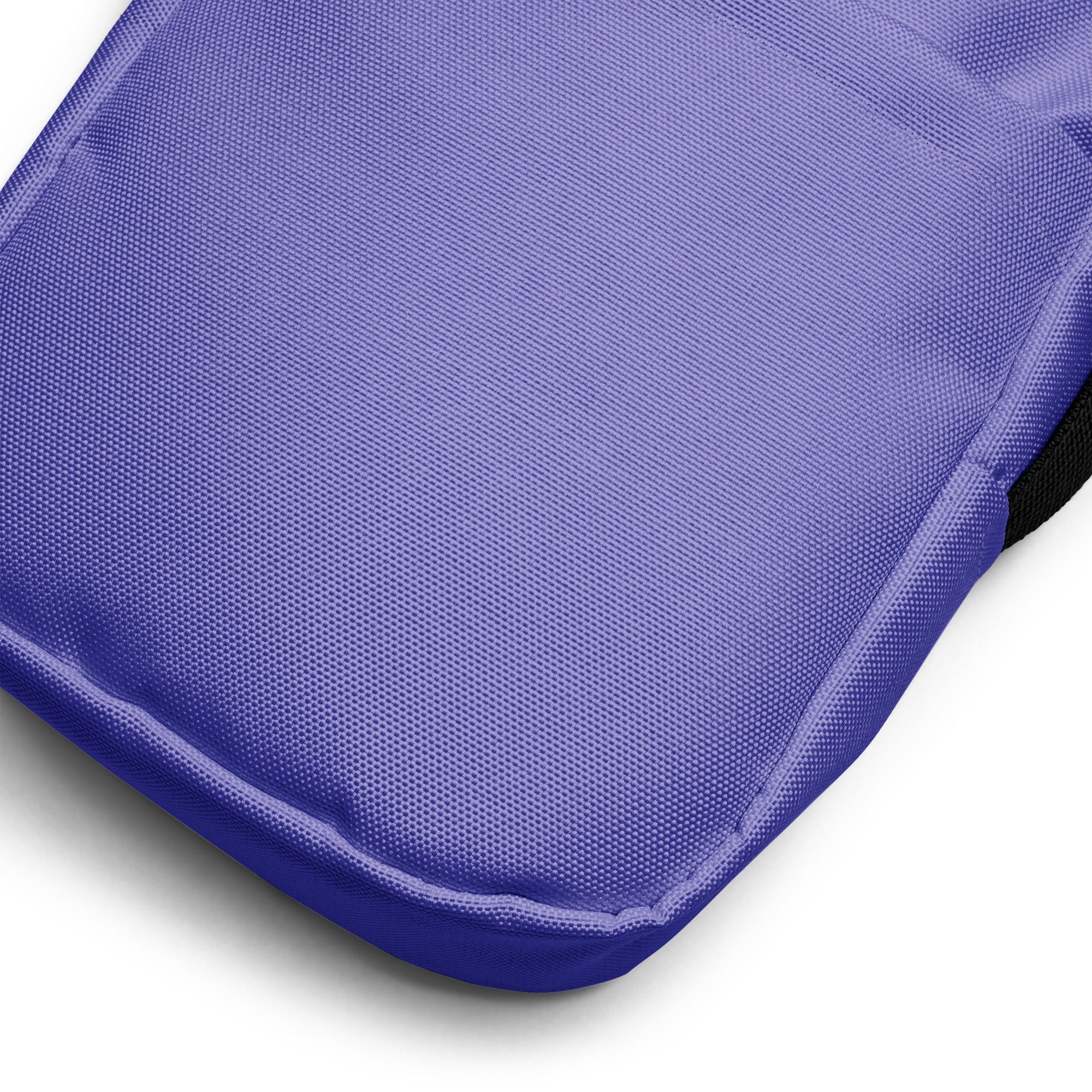 Girls purple crossbody purse featuring a purple textured fabric cushion with stitched edges