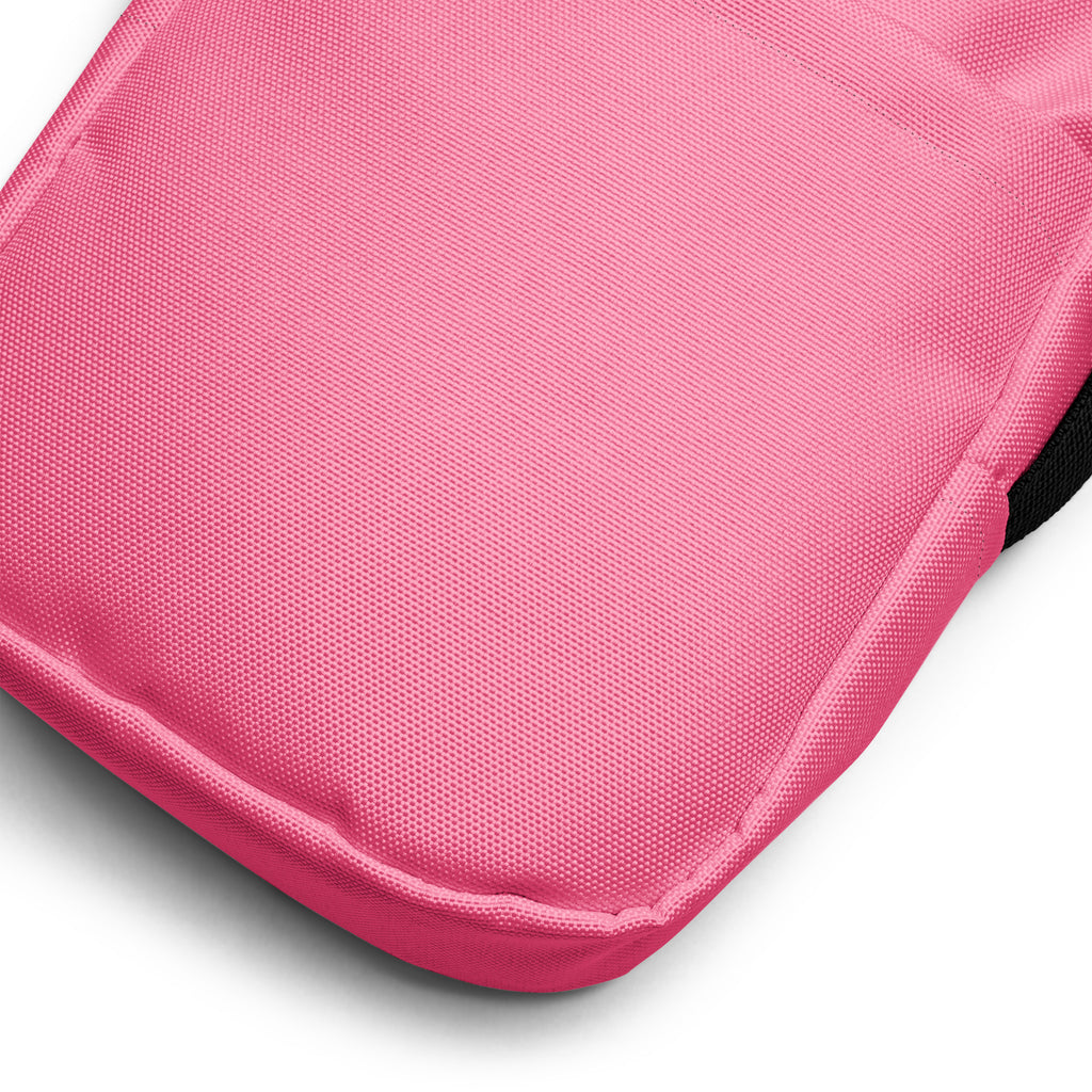 Girls pink crossbody purse with a textured woven fabric cushion and neatly stitched edges