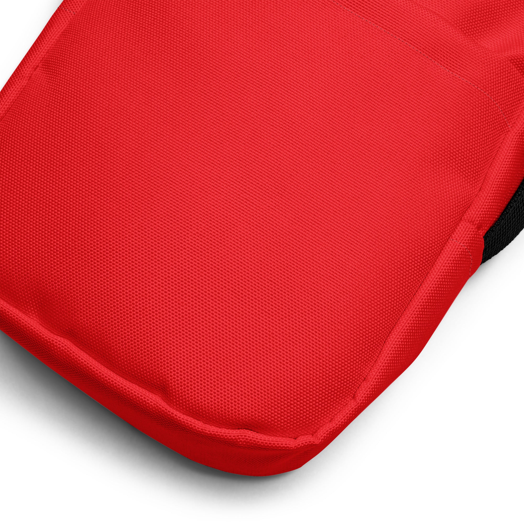 Girls red crossbody purse with a textured weave red fabric cushion and stitched edges