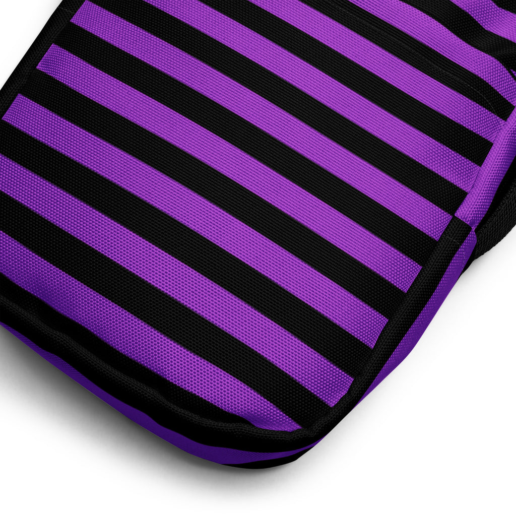 Girls purple and black striped Halloween crossbody purse with a textured woven fabric bag design