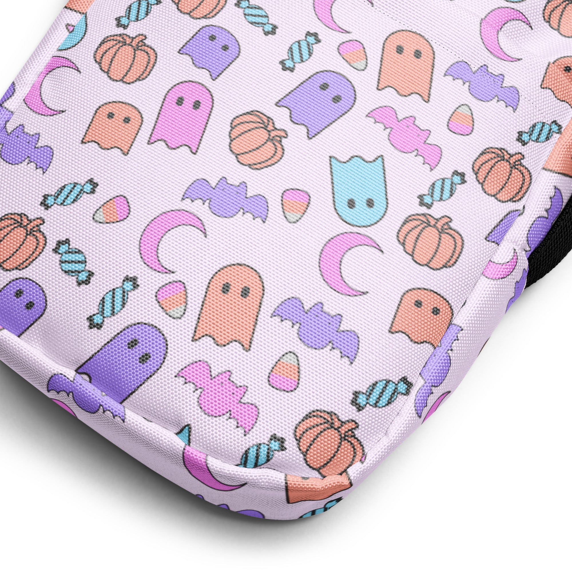 Girls ghost halloween crossbody purse made of pastel lavender fabric pouch with colorful ghosts bats pumpkins and candy pattern