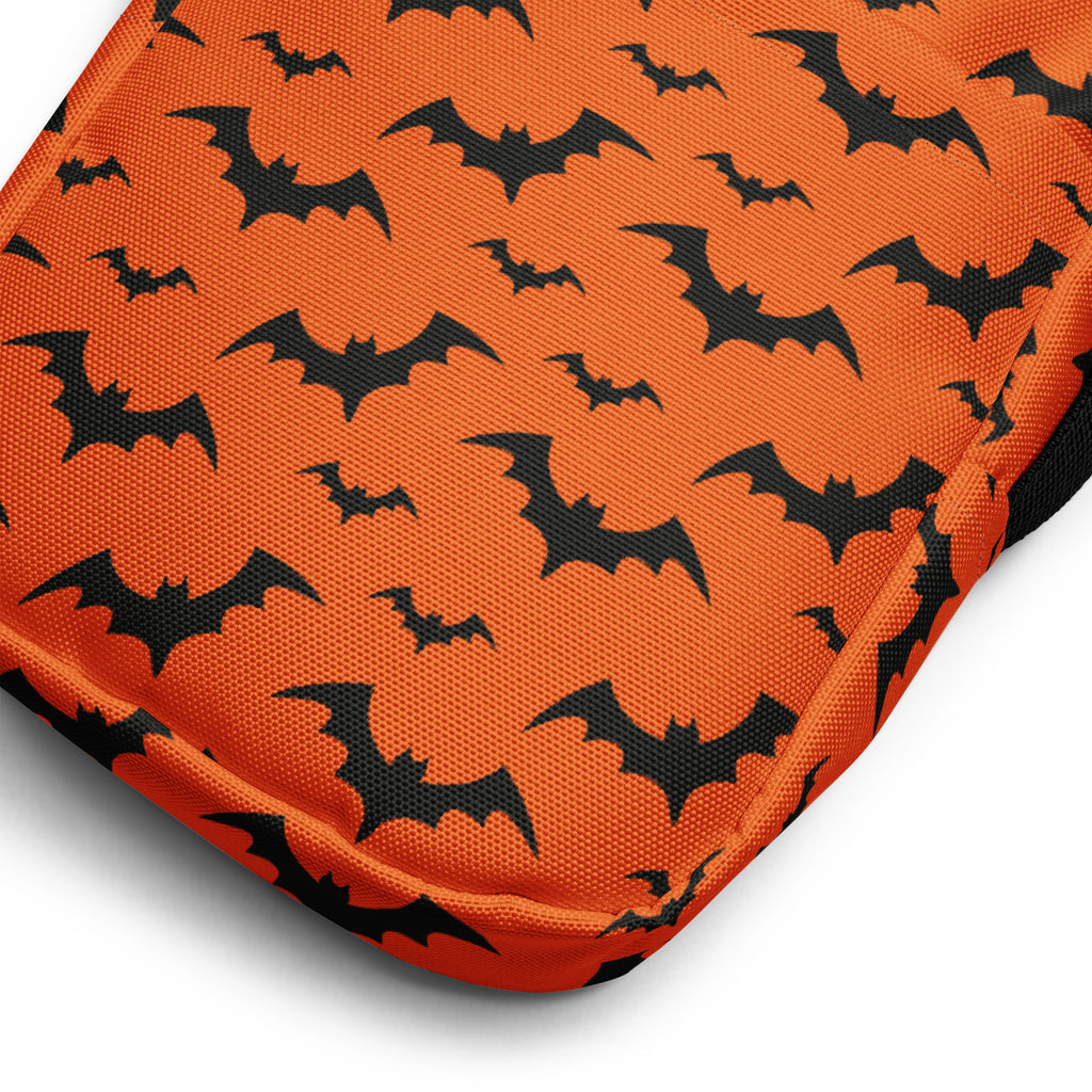Kids orange bats halloween crossbody purse featuring an orange cushion with black bat pattern for festive use
