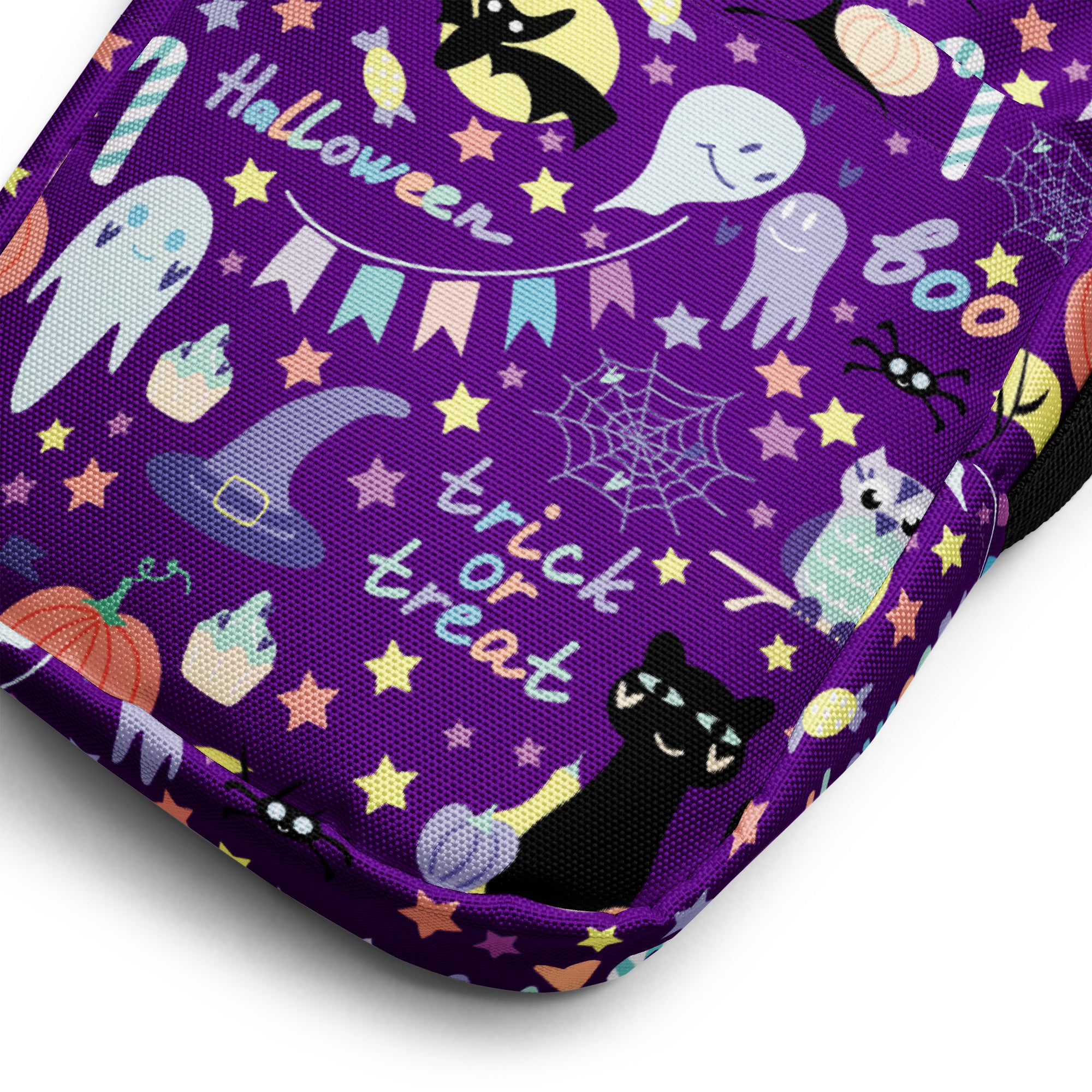 Purple halloween-themed fabric crossbody purse for girls featuring playful ghosts cats pumpkins and stars pattern