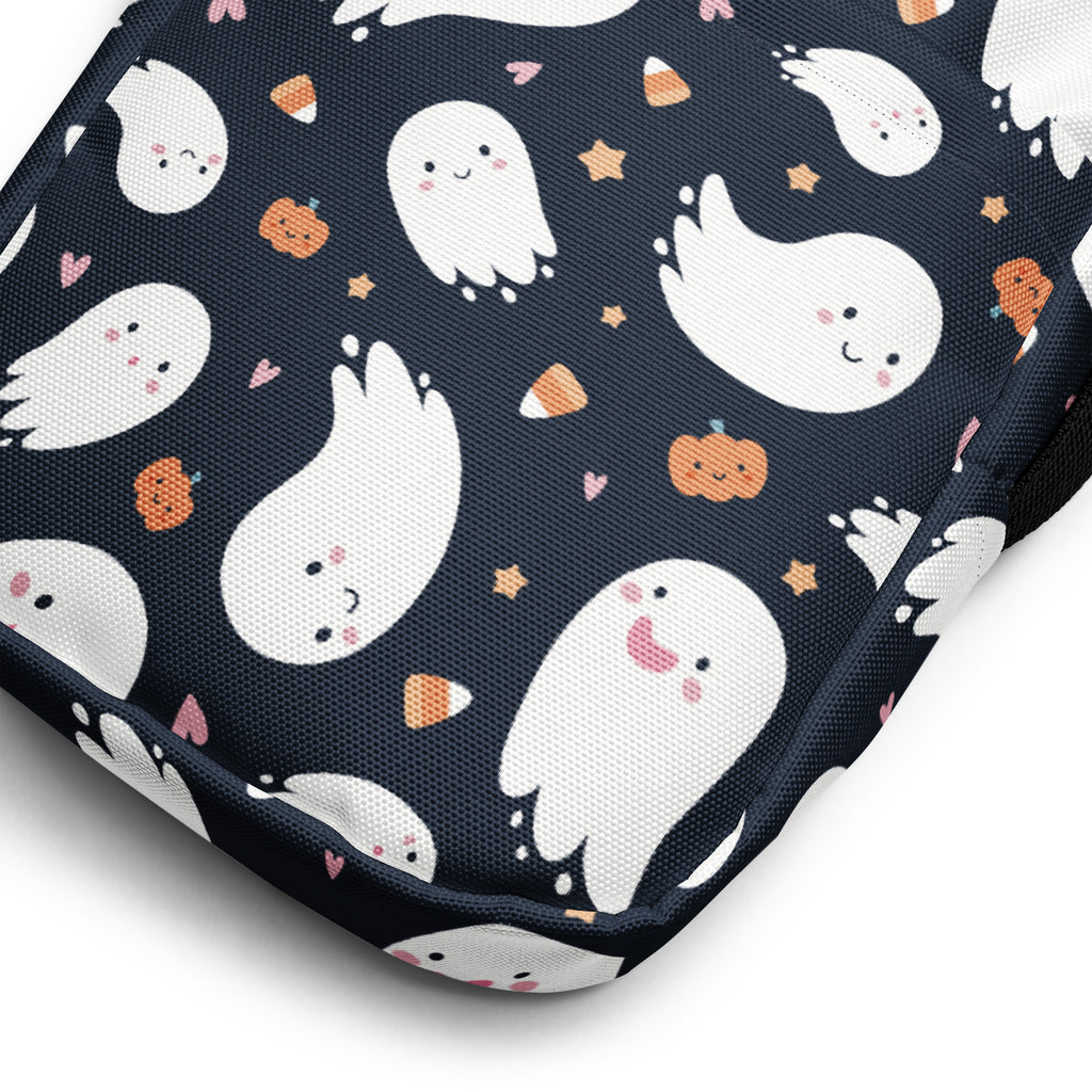 Kids ghost halloween crossbody purse made of navy blue fabric with white ghosts pumpkins candy corn and stars pattern