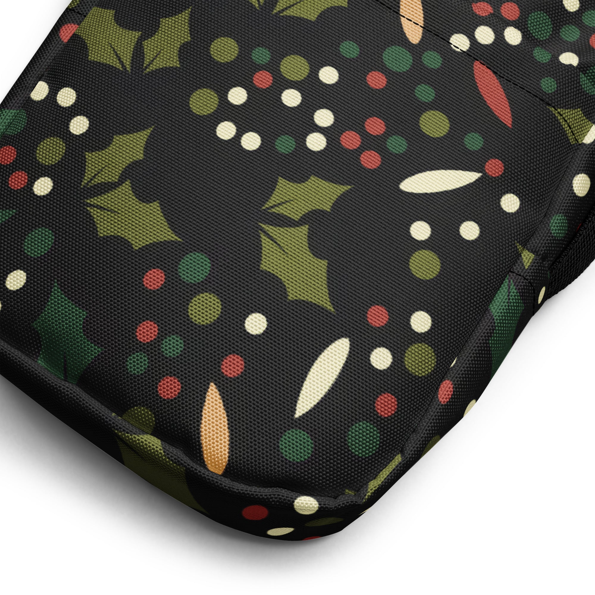 Girls Christmas holly crossbody purse in black fabric with festive green holly leaves red and white dots and olive circles