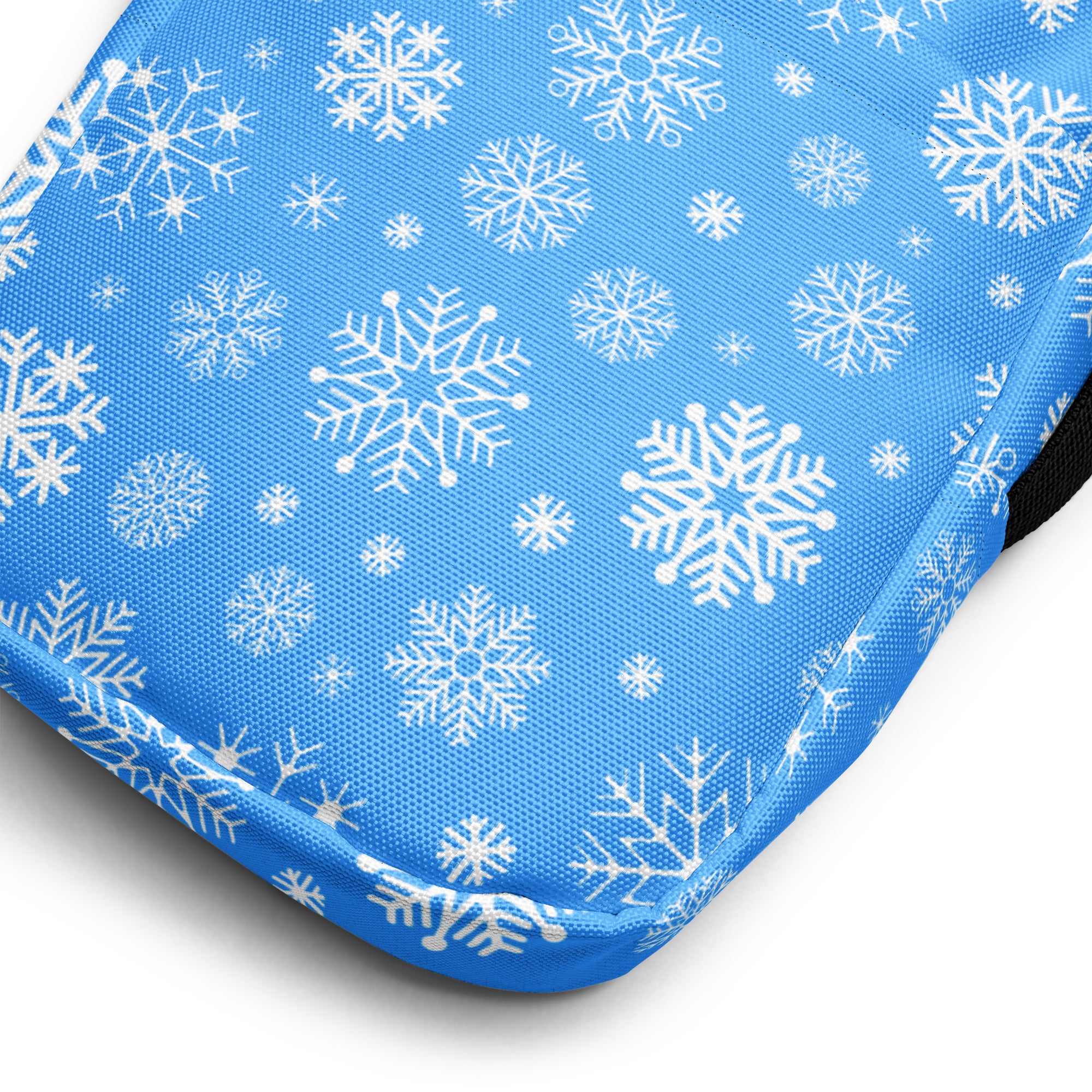 Blue snowflake winter women’s crossbody purse with blue fabric cushion and white snowflake pattern