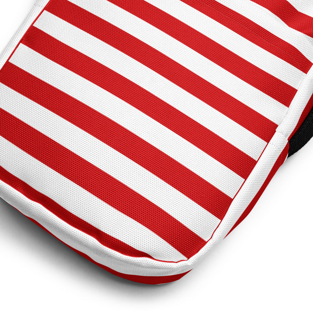 Red and white candy stripe christmas women’s crossbody purse with textured fabric and striped cushion design