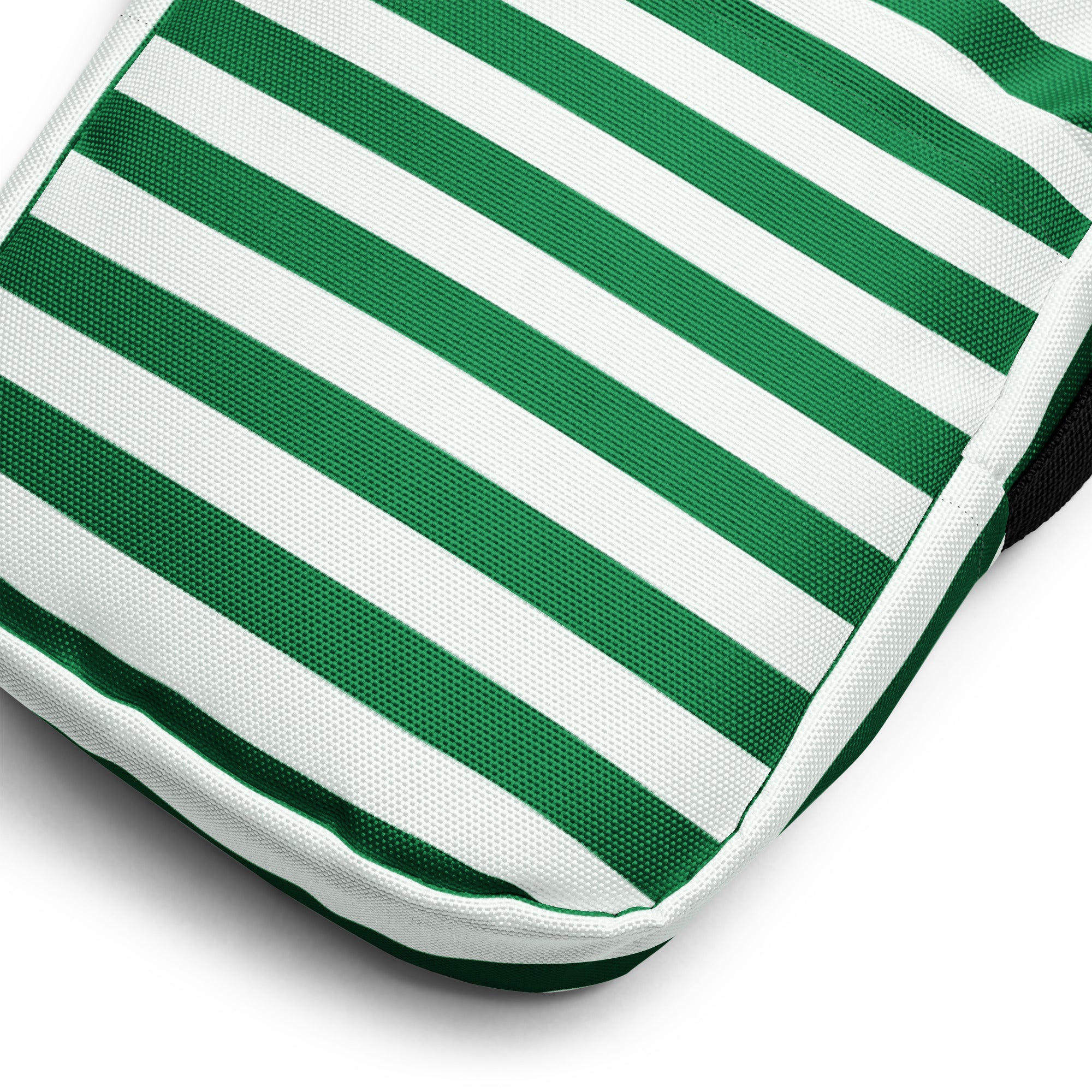 Green and white candy stripe christmas women’s crossbody purse with a textured fabric finish and outdoor cushion pattern