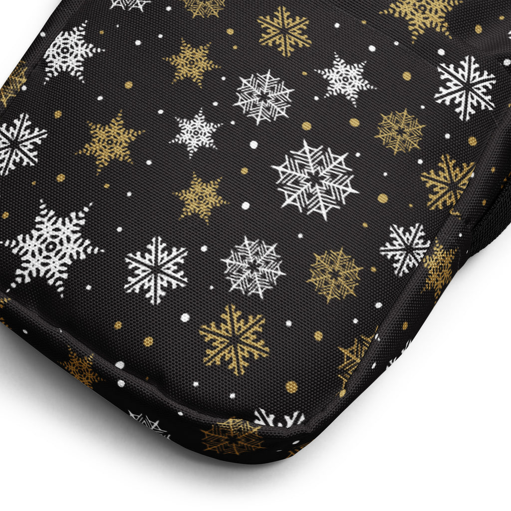 Girls black and gold snowflakes crossbody purse made of fabric with white and gold snowflake patterns