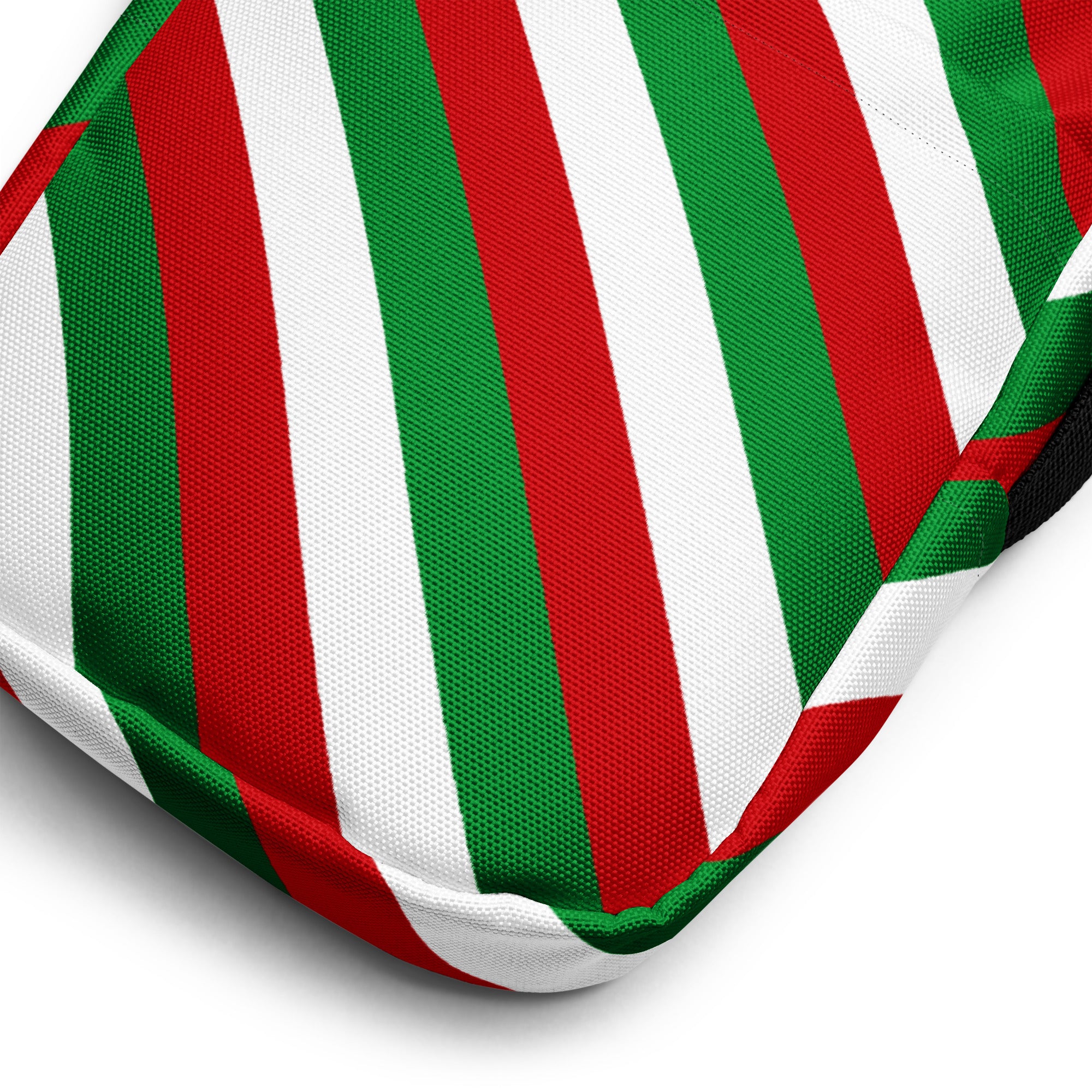 A girls red green and white stripes crossbody purse featuring a cushion with bold diagonal fabric stripes