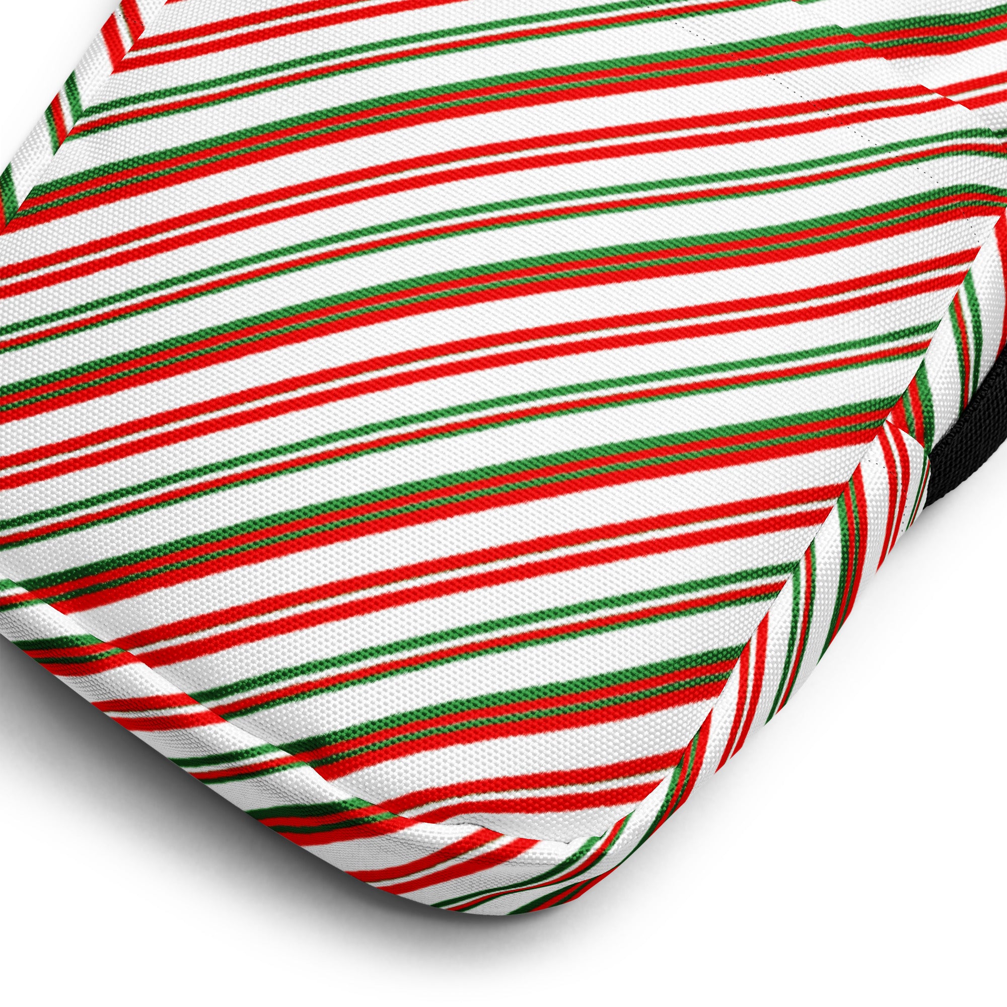 A festive multicolor diagonal candy stripe christmas women’s crossbody purse with candy cane striped cushion fabric