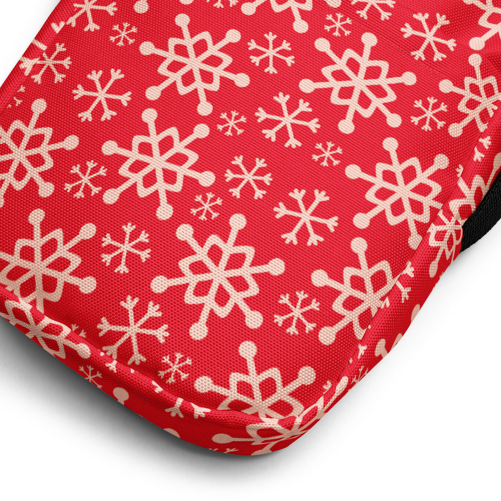 Girls red snowflakes crossbody purse made of fabric with white snowflake patterns for festive use
