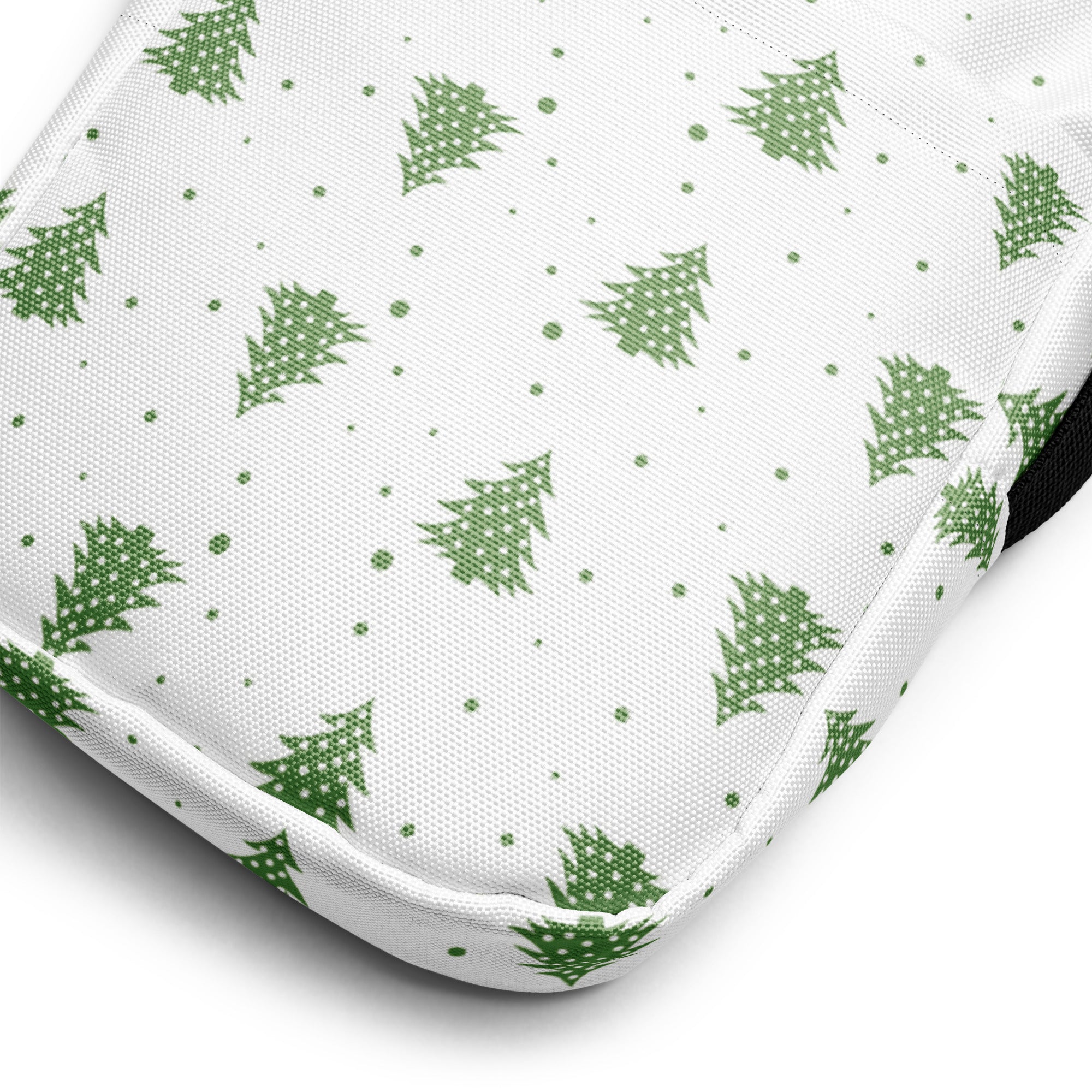 White fabric crossbody purse with green pine tree pattern and dotted accents for christmas winter style
