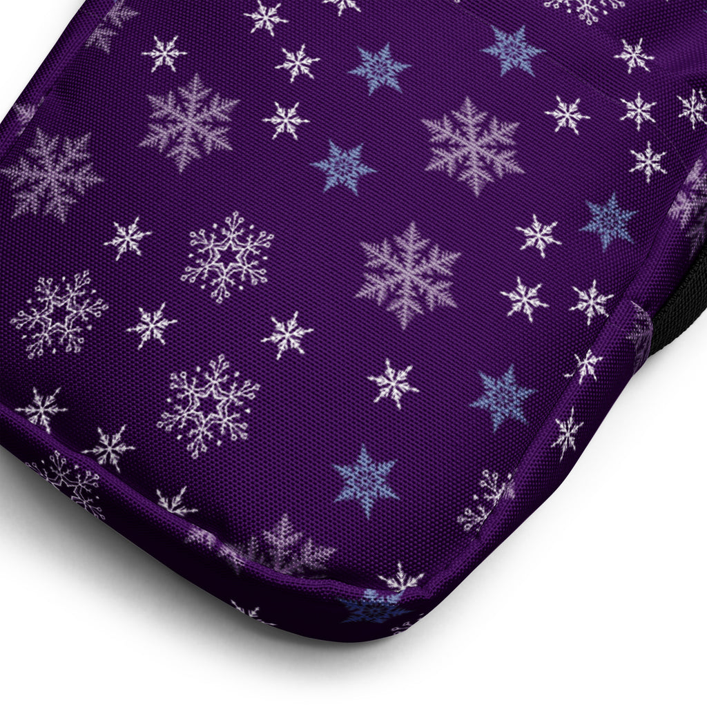 Girls purple crossbody purse with snowflake pattern fabric cushion in white and light blue designs