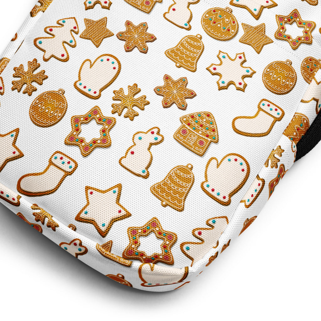 White canvas crossbody purse with gold gingerbread cookies and holiday ornaments festive pattern