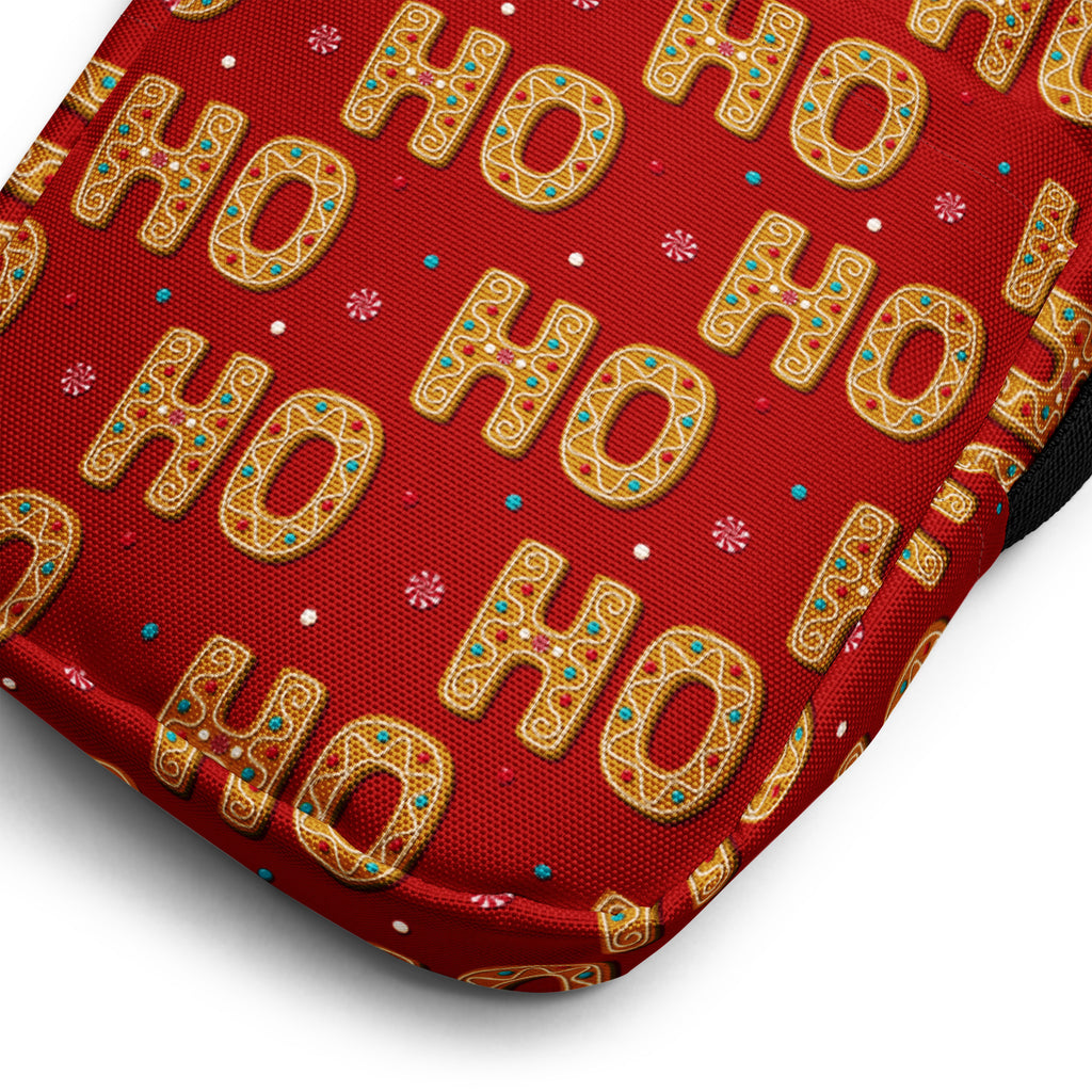 Red crossbody purse with festive golden ho ho ho gingerbread cookie pattern on fabric pouch for women Christmas use