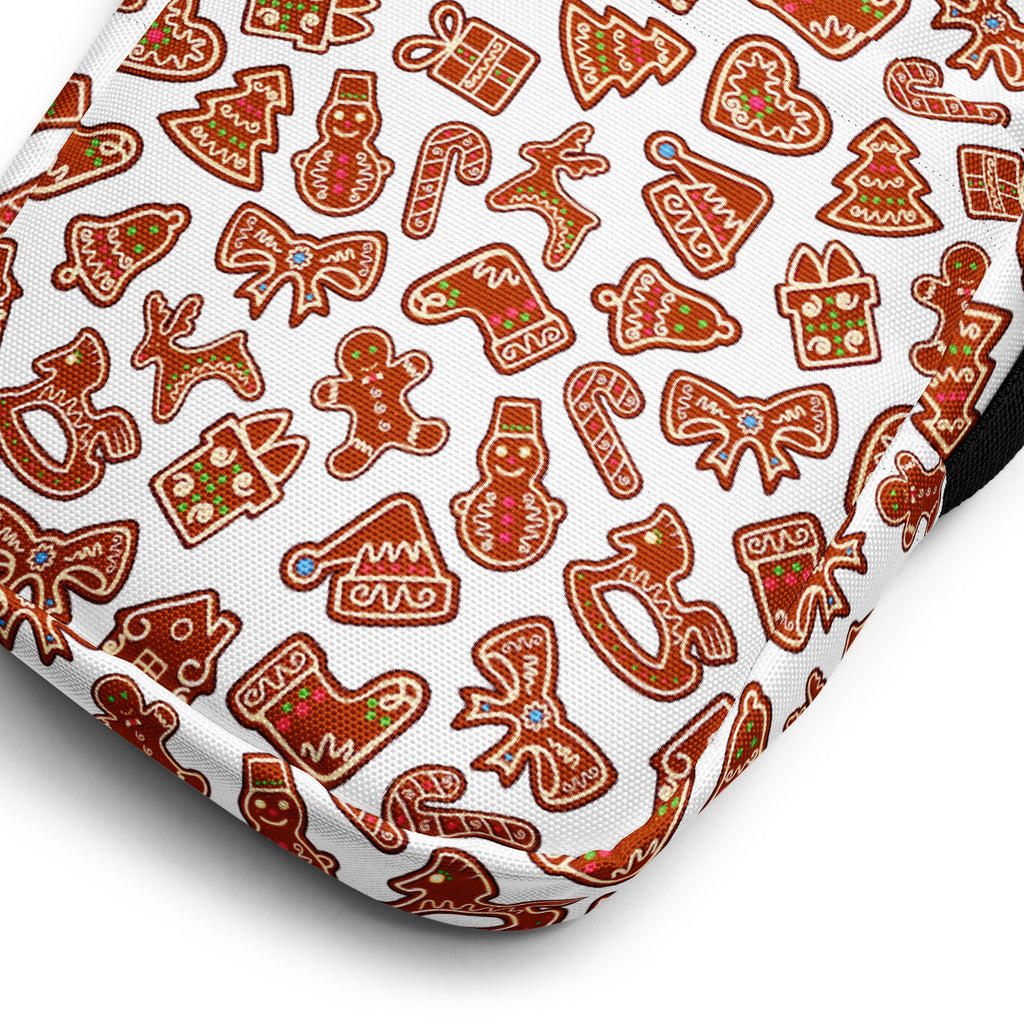 White fabric crossbody purse with brown gingerbread holiday icons of snowmen reindeer and candy canes for women