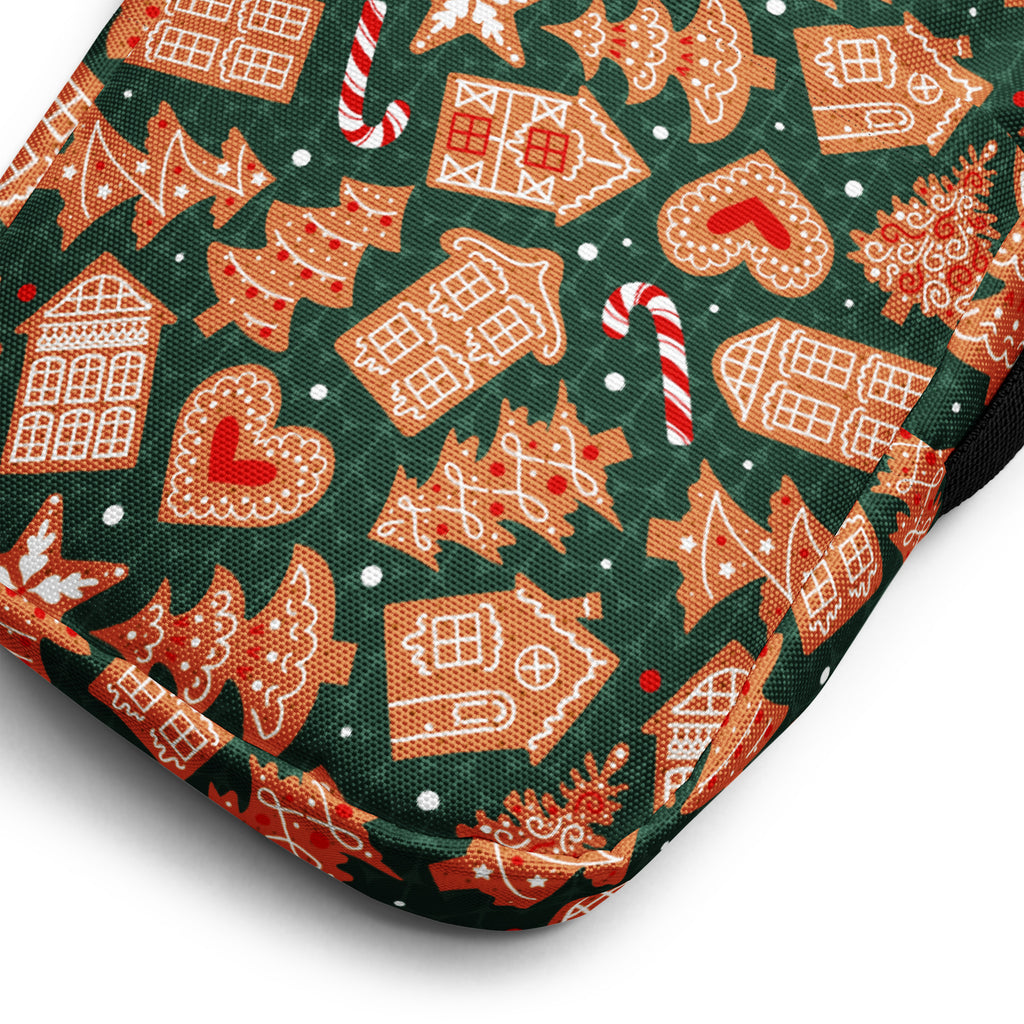 Girls green gingerbread christmas crossbody purse with festive orange and white gingerbread house candy cane motifs