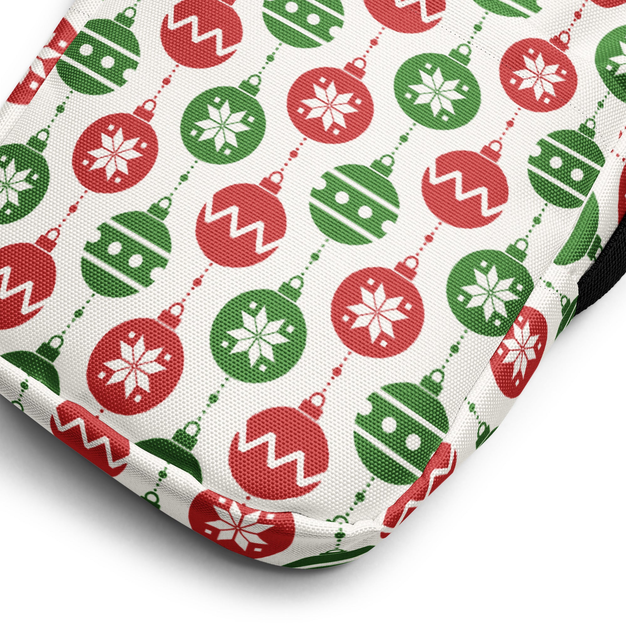 A festive white fabric girls Christmas ornaments crossbody purse with red and green ornament patterns and snowflakes