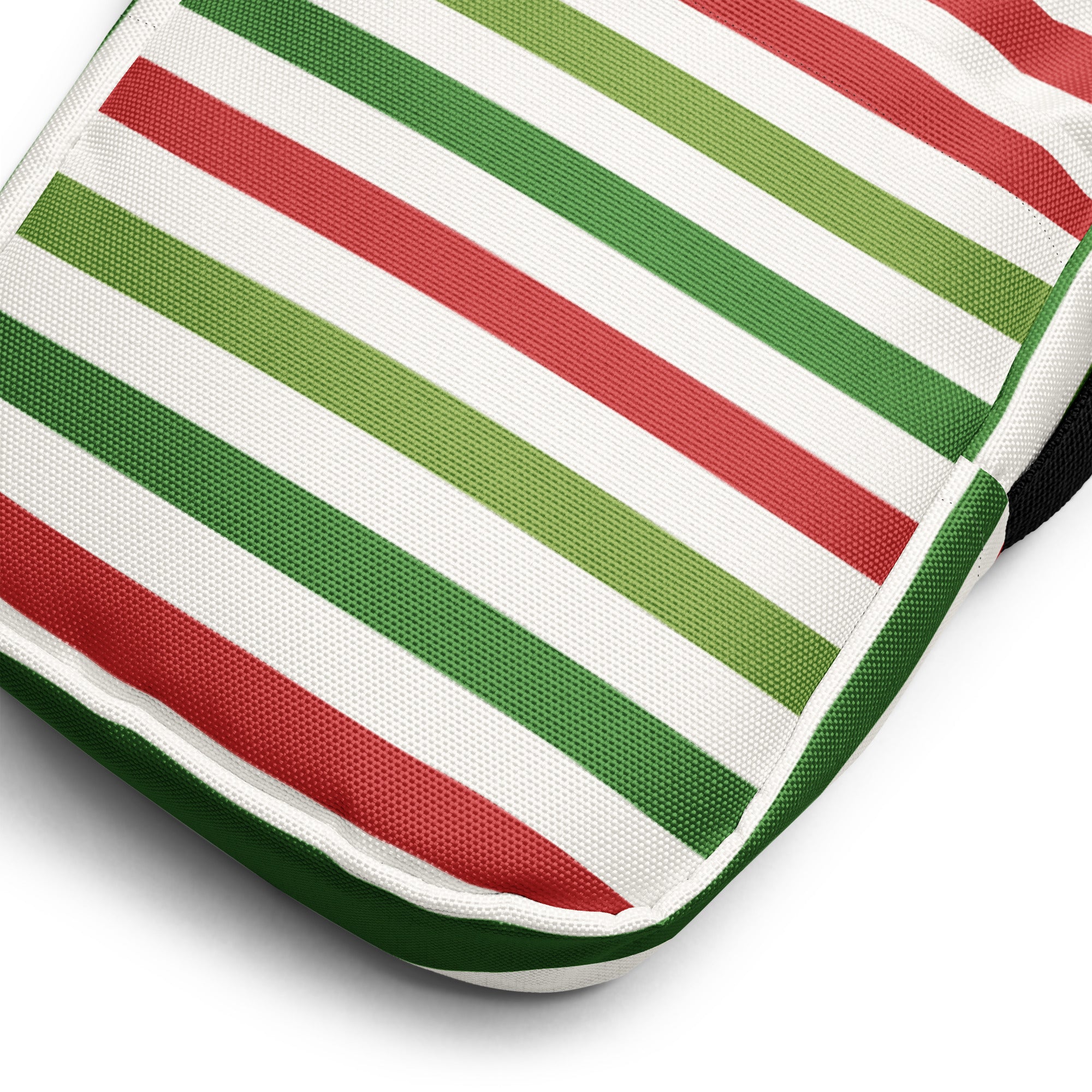 A christmas striped womens crossbody purse with bold red and green diagonal stripes on white durable fabric