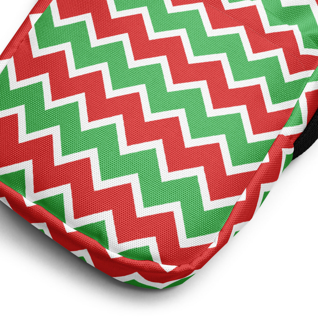 Girls red and green chevron crossbody purse with a fabric cushion and white trim detail