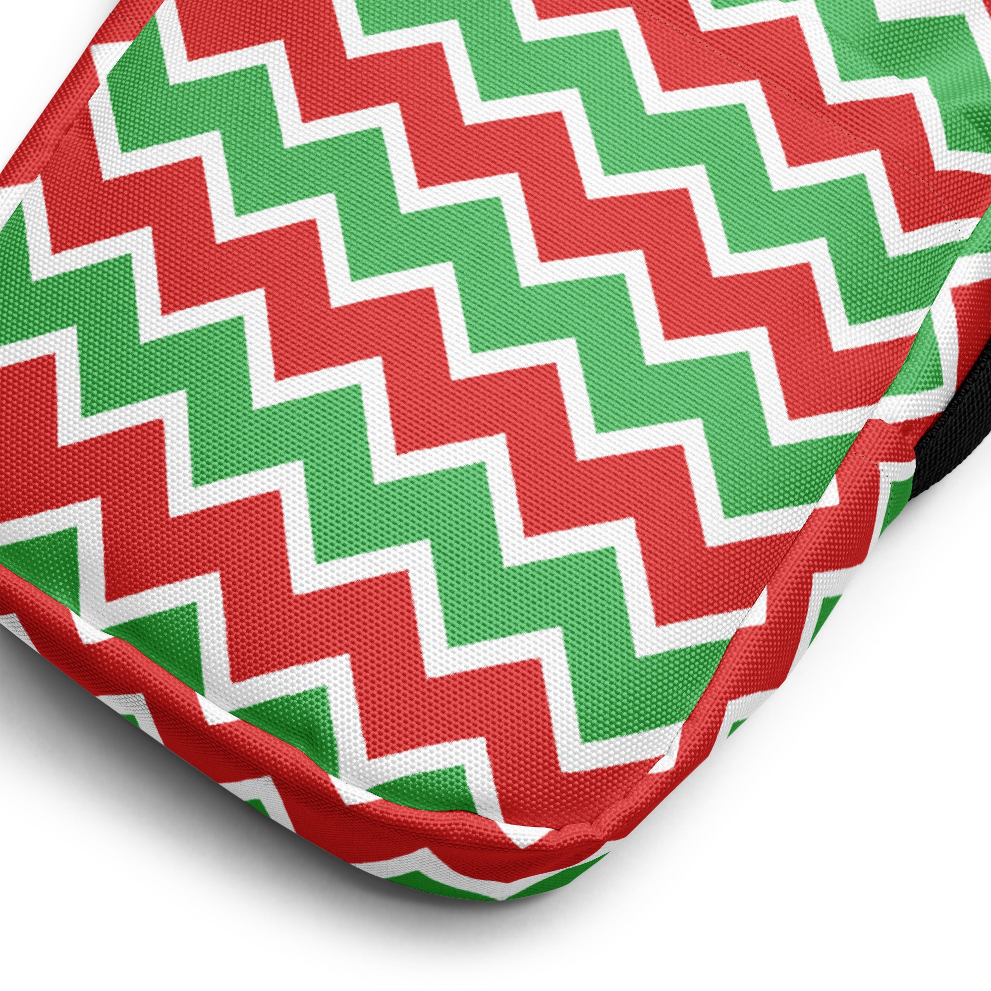 Girls red and green chevron crossbody purse with a fabric cushion and white trim detail