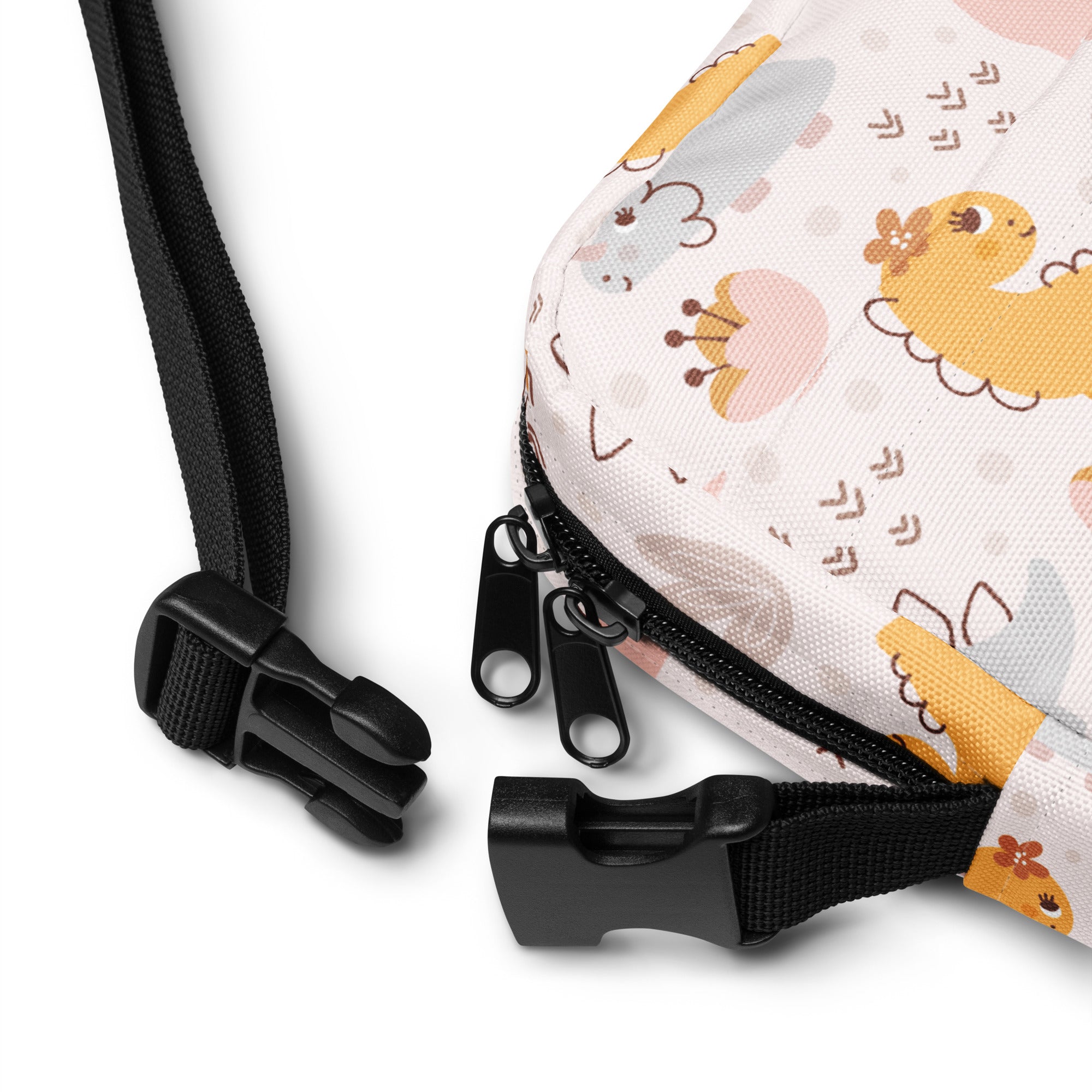 Girls floral dinosaur crossbody purse with soft pastel pattern and cute yellow gray dinosaurs on light fabric
