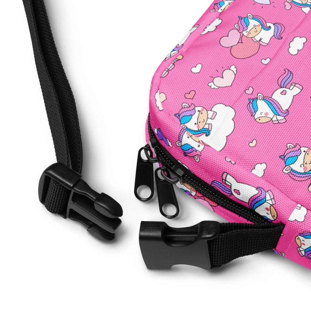 Girls pink unicorn crossbody purse with black zipper and adjustable strap perfect for everyday use