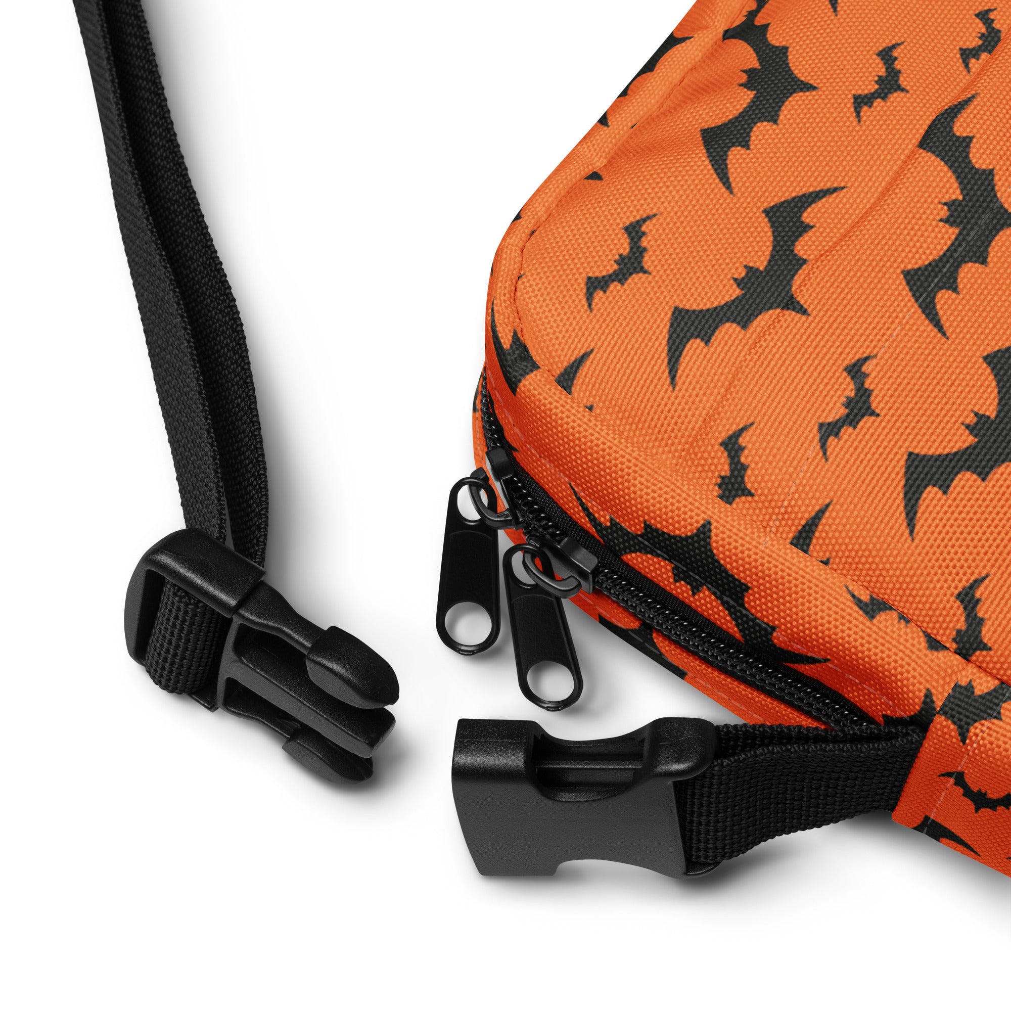 Kids orange bats halloween crossbody purse made of fabric with a black bat pattern and black zipper pulls