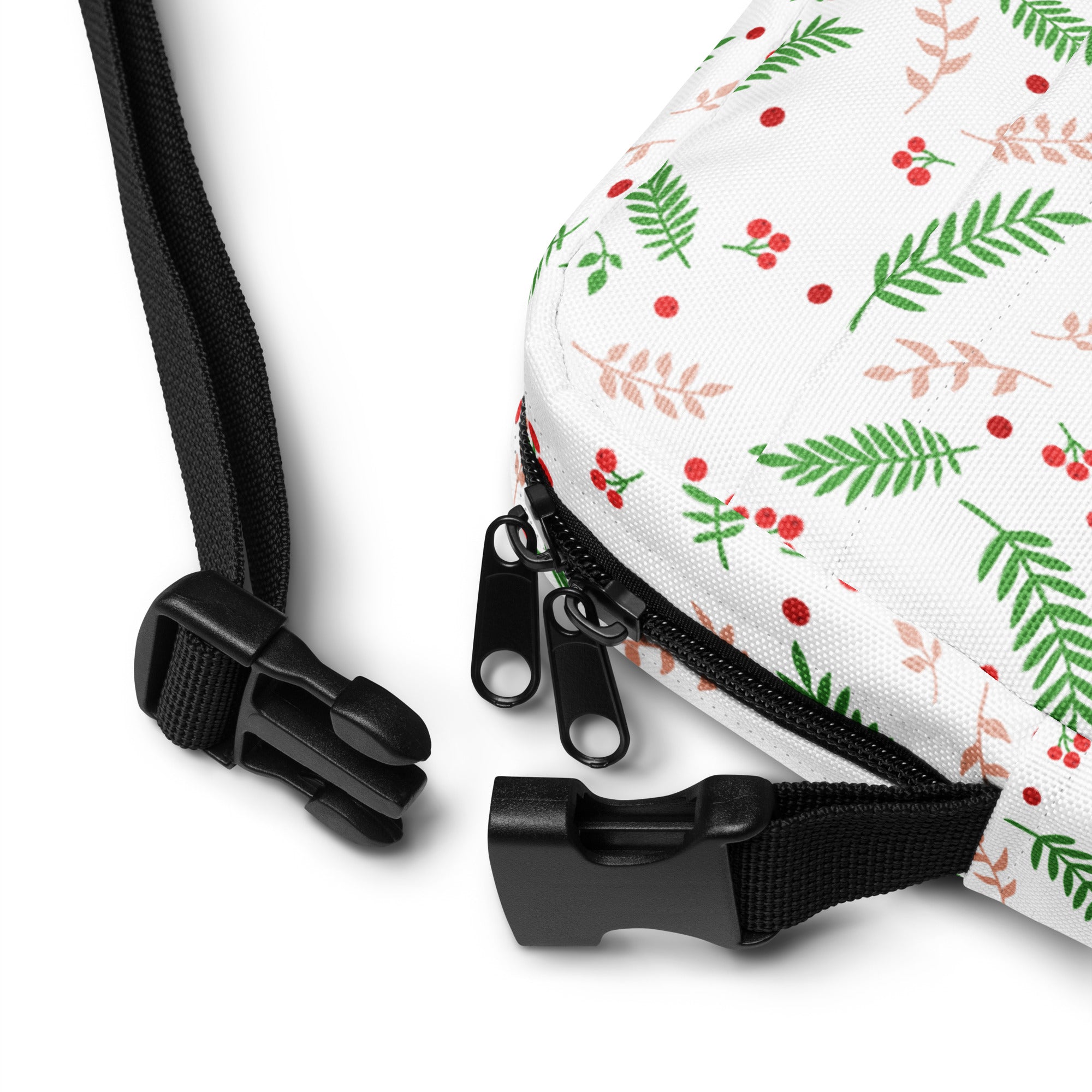Girls winter greenery and red berries white crossbody bag with festive green leaves pink stems and red berries pattern