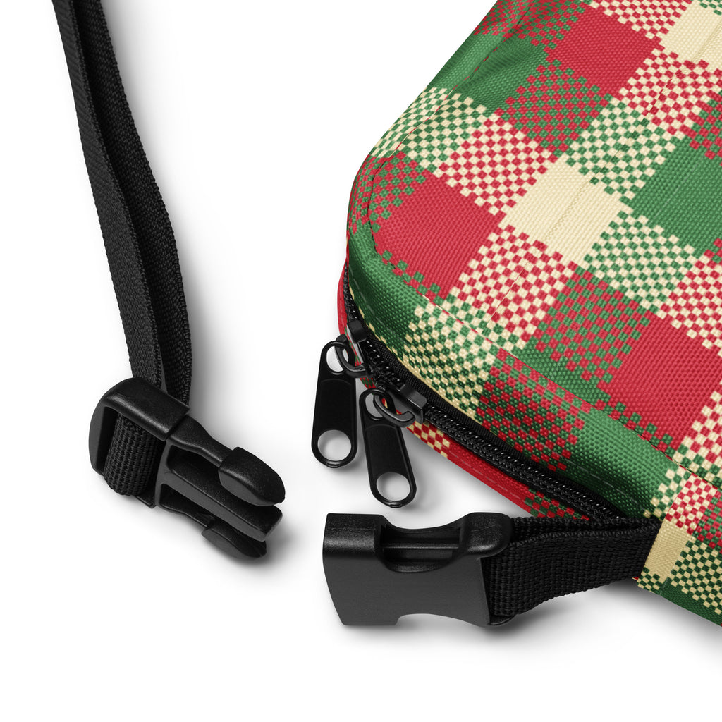 Christmas plaid winter women’s crossbody purse in red green and cream plaid with black zippers and adjustable straps