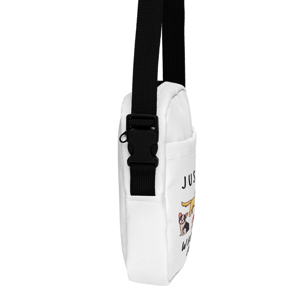 White canvas girls crossbody purse with black adjustable strap and playful cartoon dog design on the side