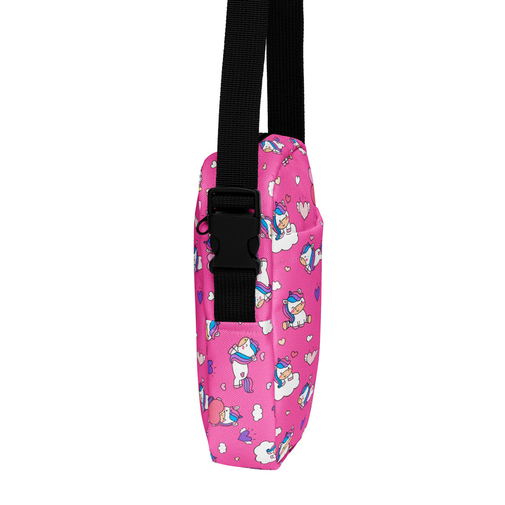 Girls pink unicorn crossbody purse made of fabric with black adjustable strap and buckle for easy carrying
