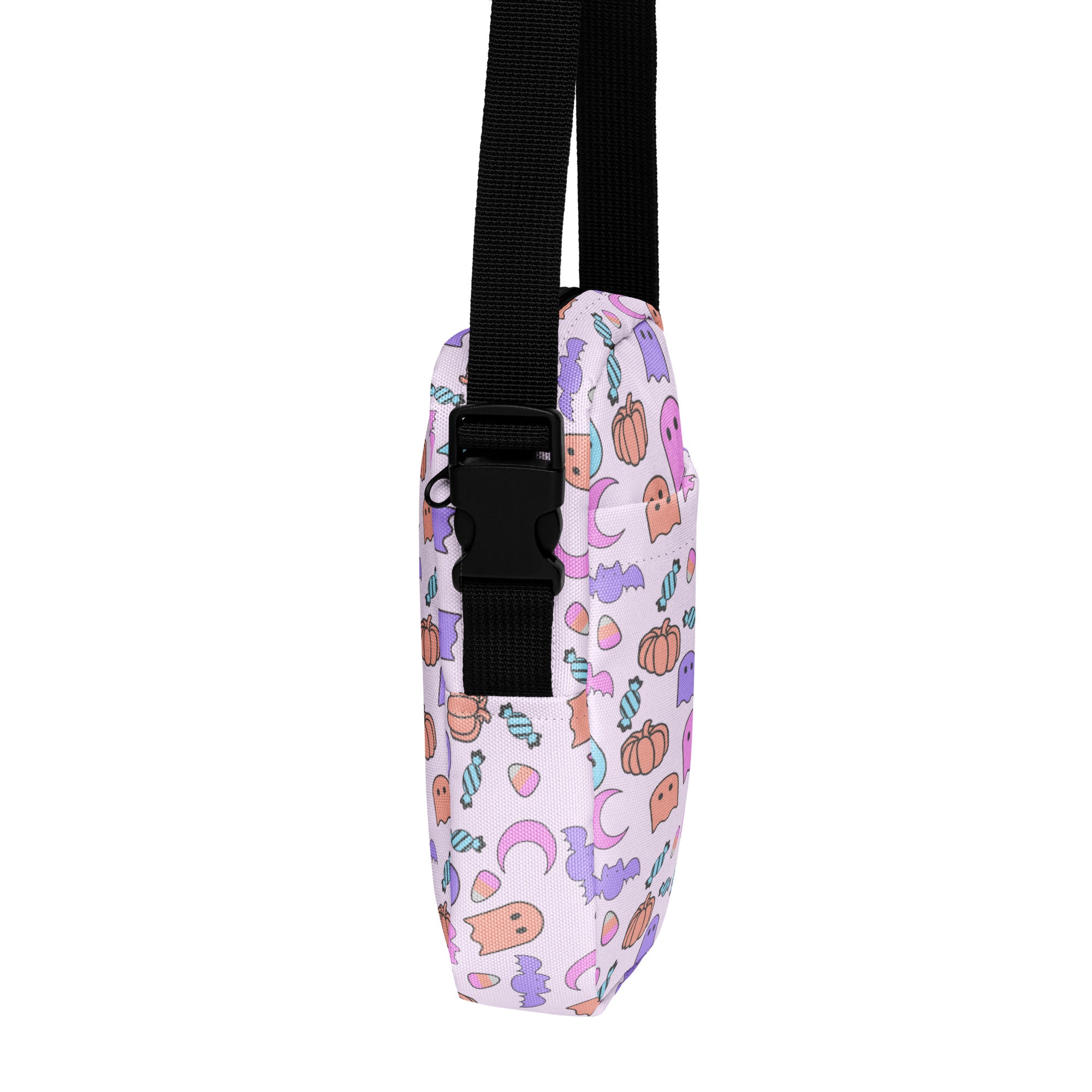 Girls ghost halloween crossbody purse in pink and purple with a black adjustable strap for easy carrying