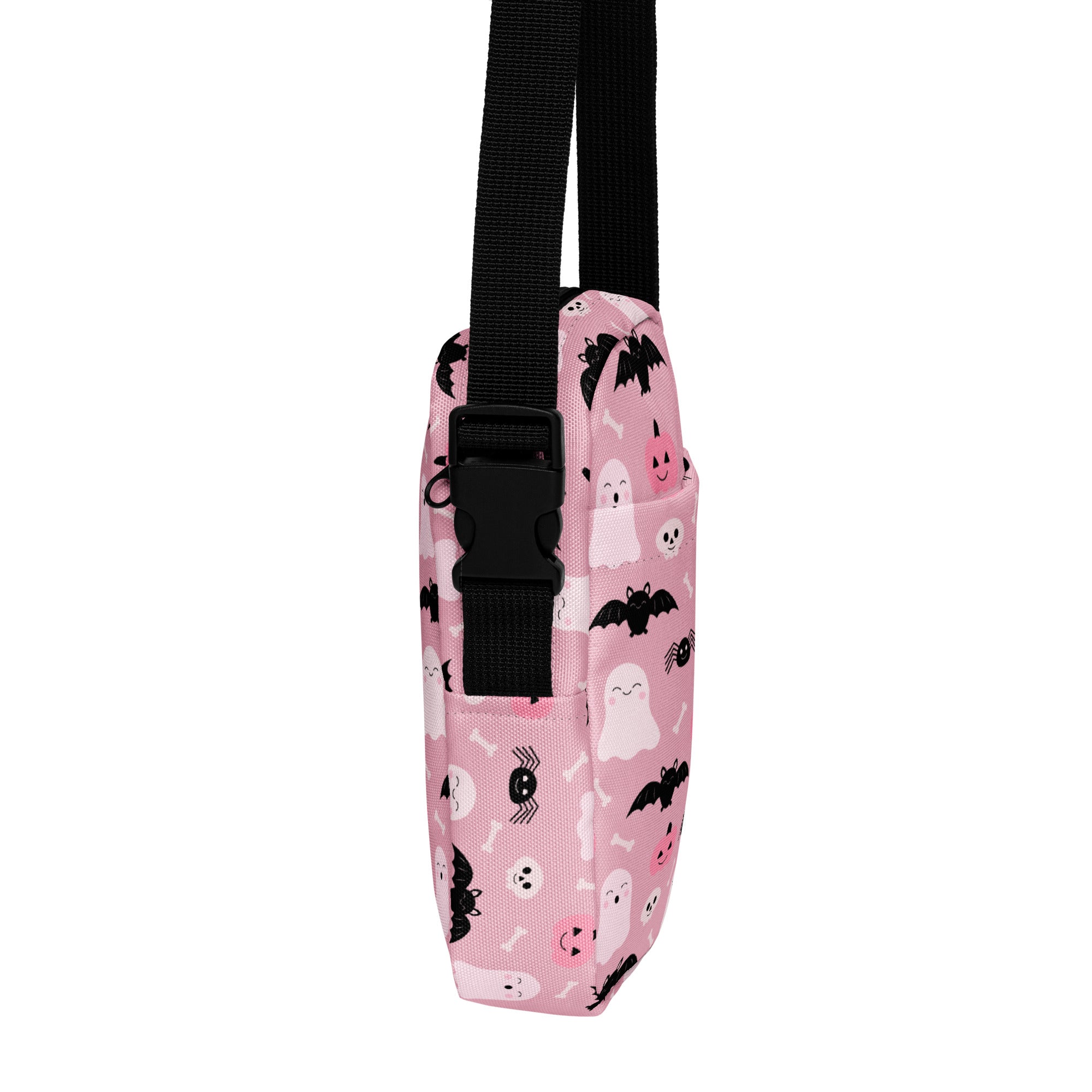 Girls cute ghost and bats pink halloween crossbody purse with black straps and buckle featuring spooky prints