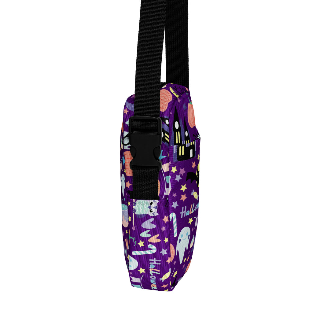 Girls spooky halloween crossbody purse in purple with black strap and cartoon halloween designs for festive use