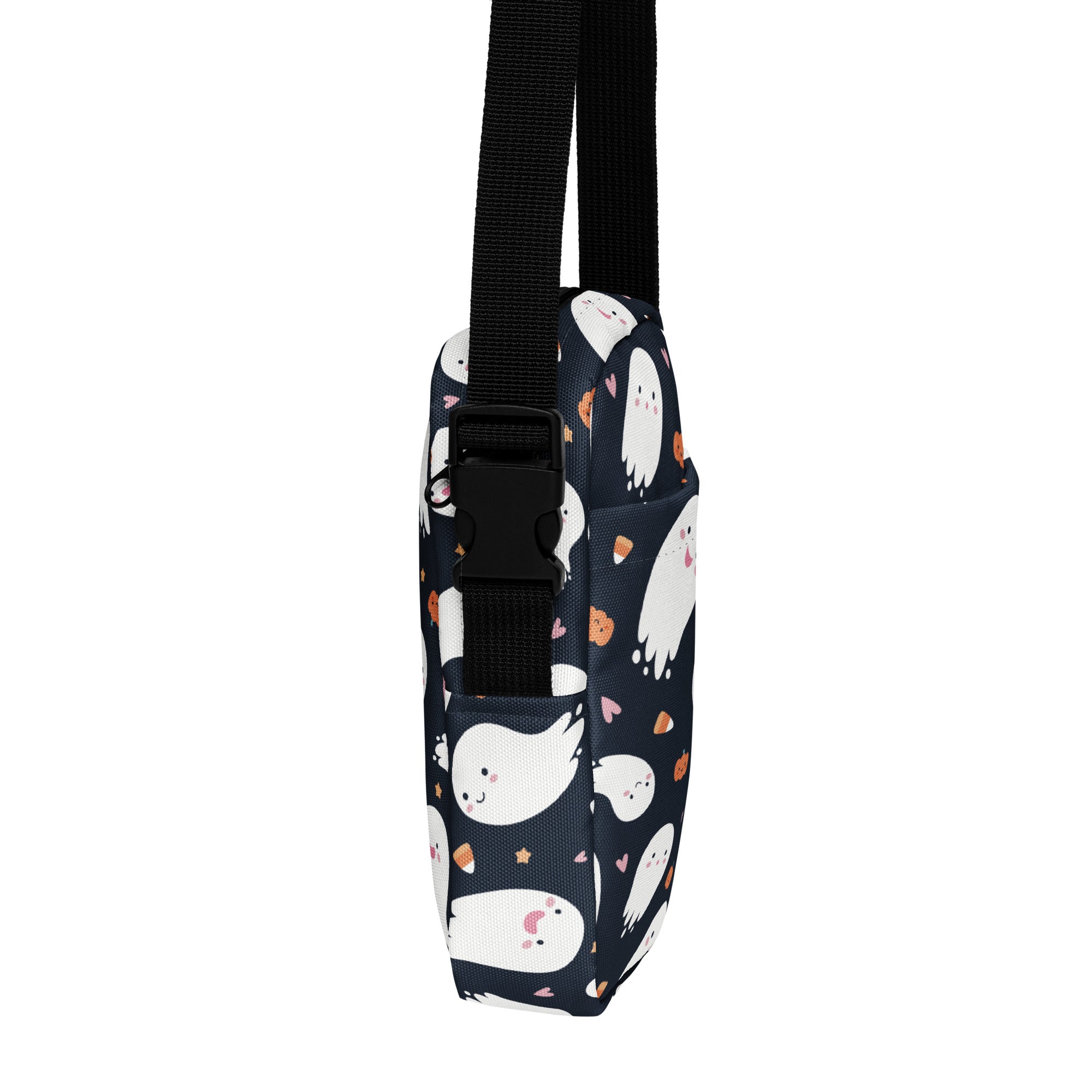 A navy blue kids ghost halloween crossbody purse with white ghosts orange pumpkins and pink hearts pattern