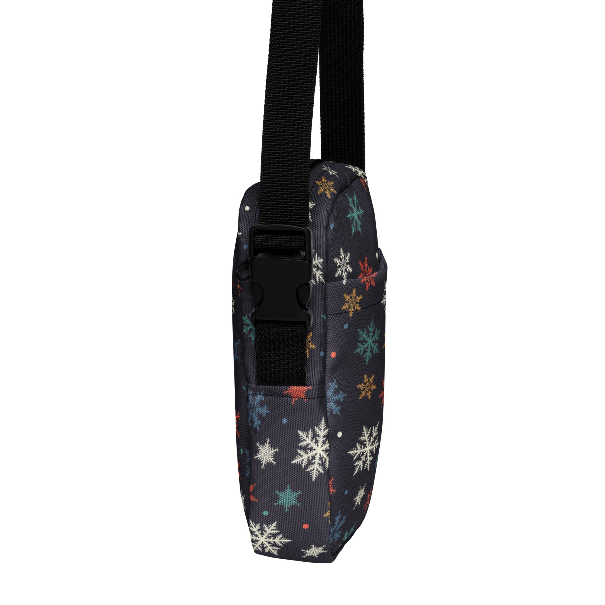 Black fabric girls crossbody purse with colorful white teal and gold snowflake pattern for everyday use