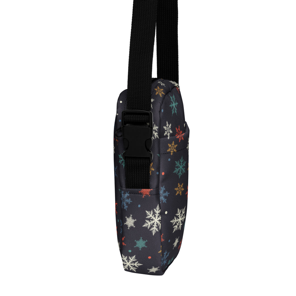 Black fabric crossbody purse with colorful white teal and gold snowflake pattern for women
