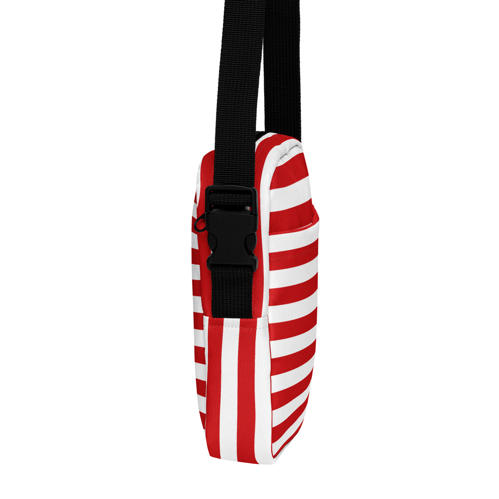 Girls red and white stripes crossbody purse with vertically striped fabric and black adjustable strap with buckle