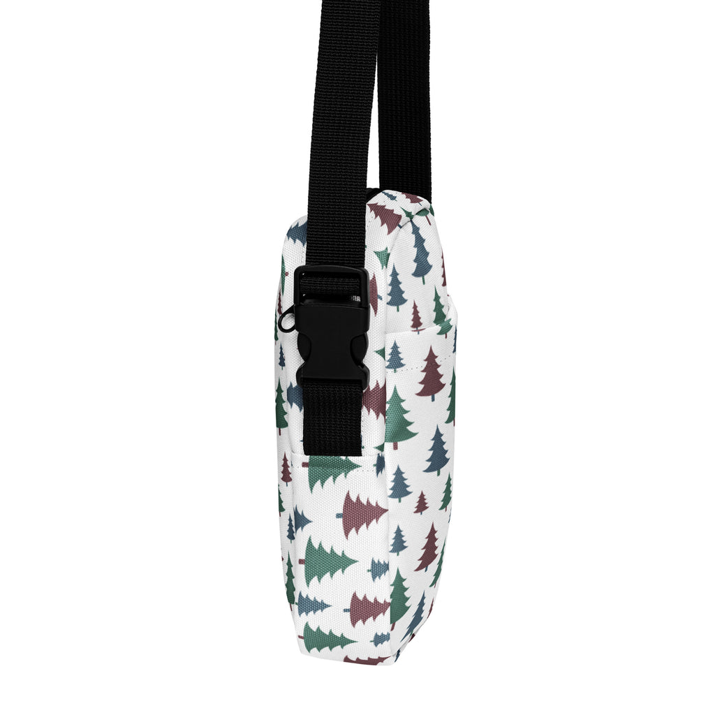 White canvas girls crossbody purse with green and maroon pastel christmas tree pattern and black adjustable strap
